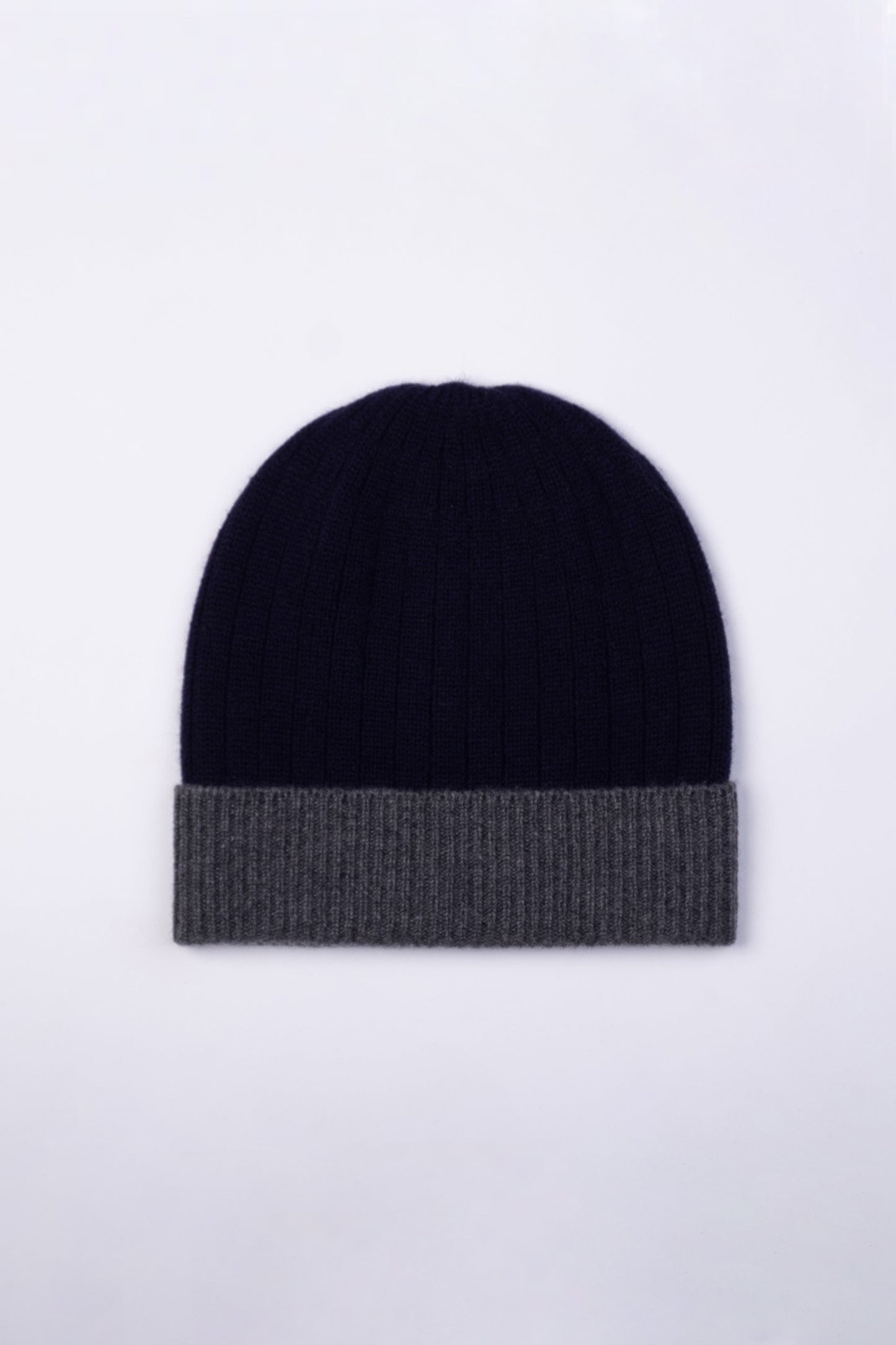 Unisex Cashmere Colour Block Ribbed Beanie Hat in navy blue with contrasting grey folded cuff, ribbed knit texture