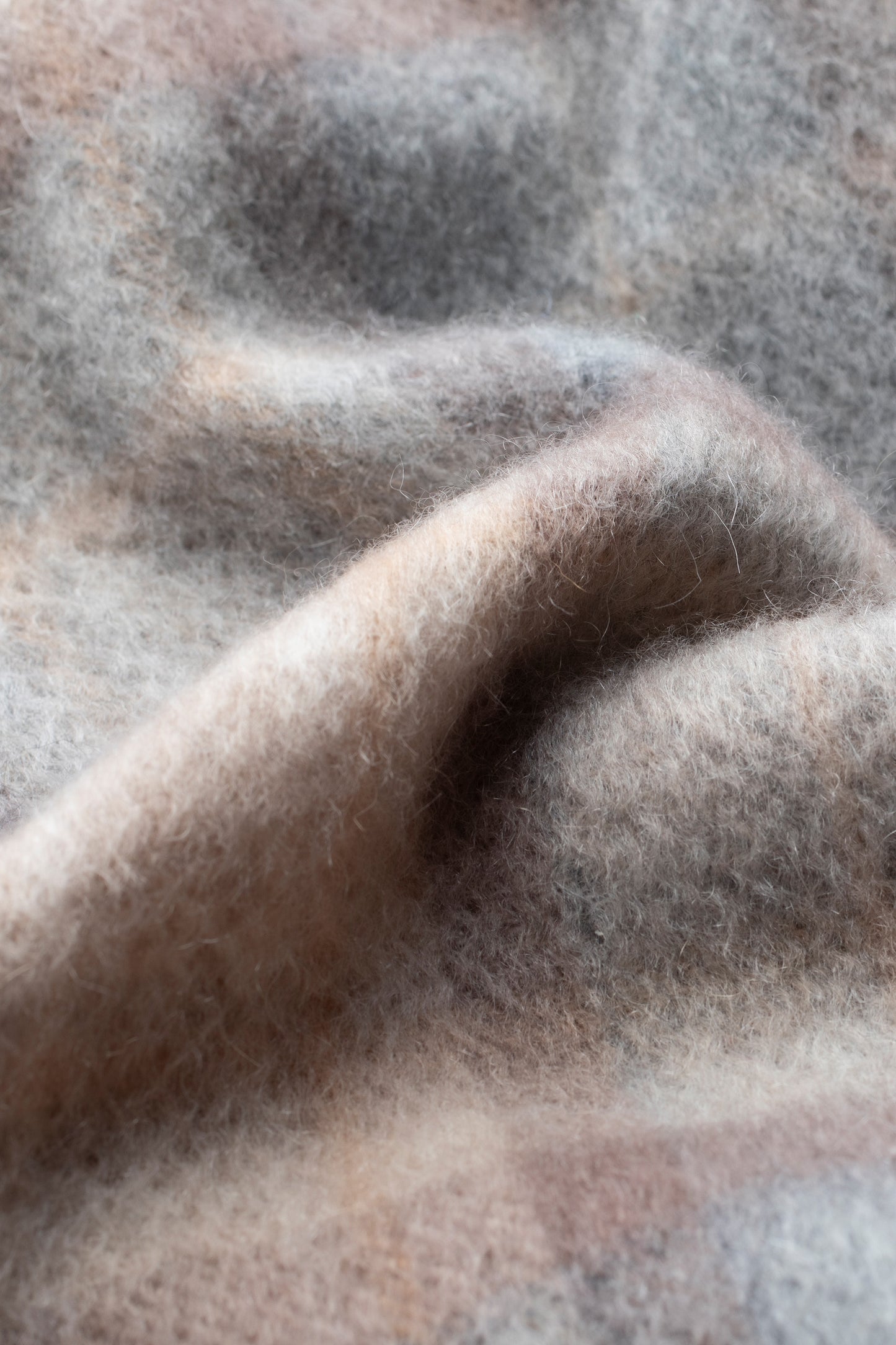 Close-up of Heritage Tartan Cashmere Scarf - Mackellar Natural showing soft brushed texture in muted grey and blush tones