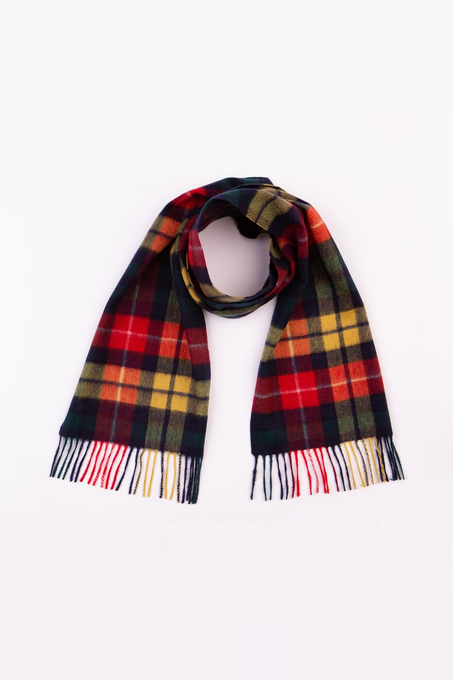 Heritage Tartan Cashmere Scarf in Buchanan Modern draped in a loop showing full tartan pattern in red, green, navy, and yellow with fringed ends
