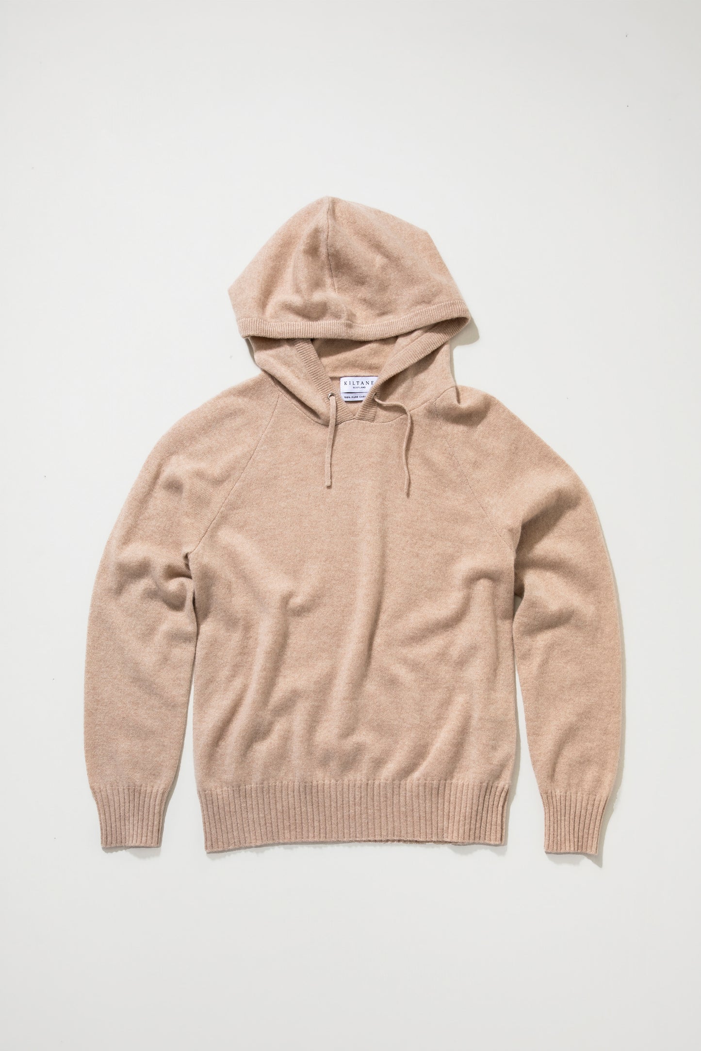 Kiltane Unisex Cashmere Hoodie in Vicuna laid flat, showing front view with drawstring hood and ribbed cuffs