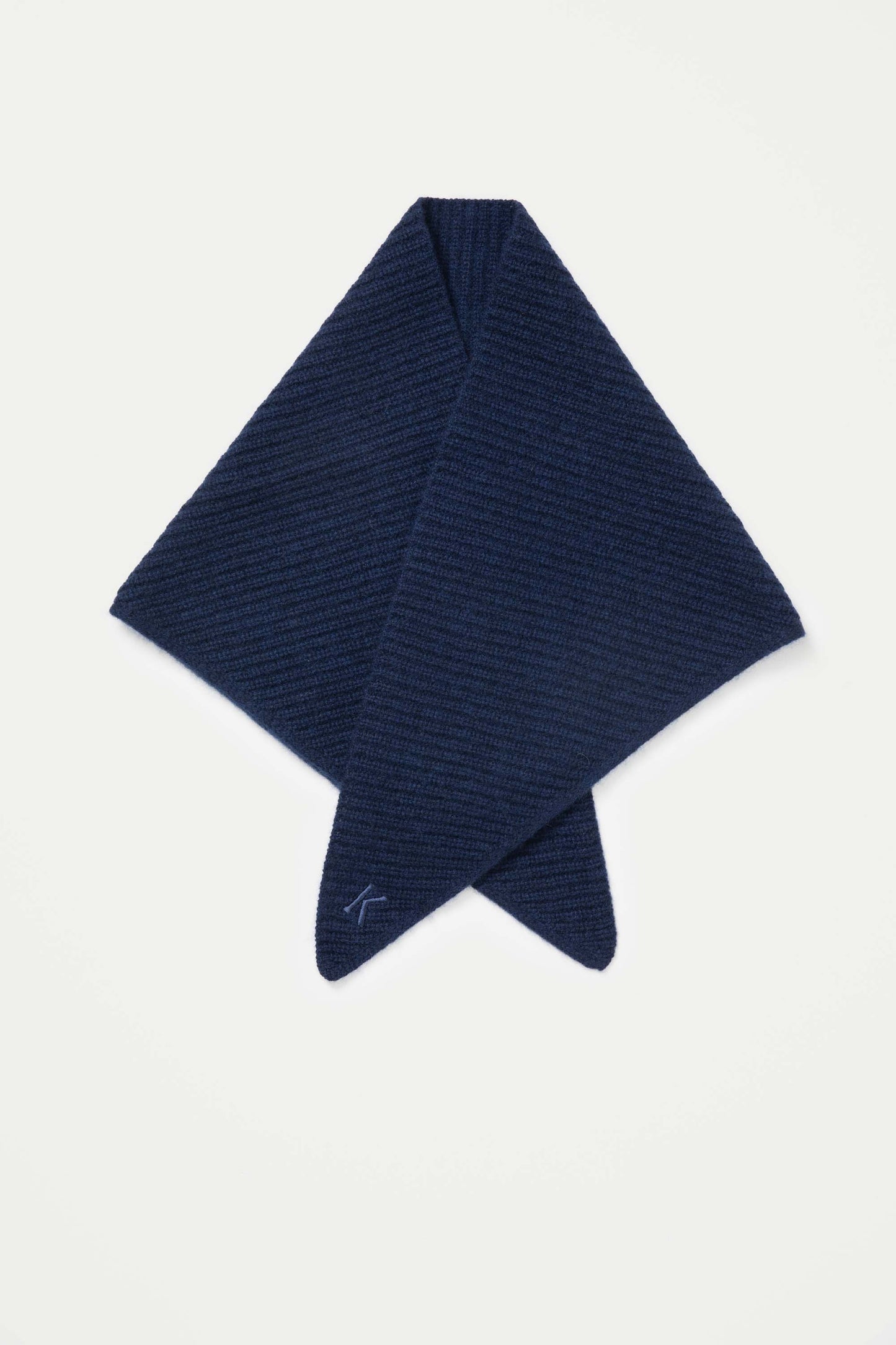 Knitted Cashmere Neck Tie in Cosmos laid flat showing diamond-shaped drape and ribbed knit texture with embroidered logo