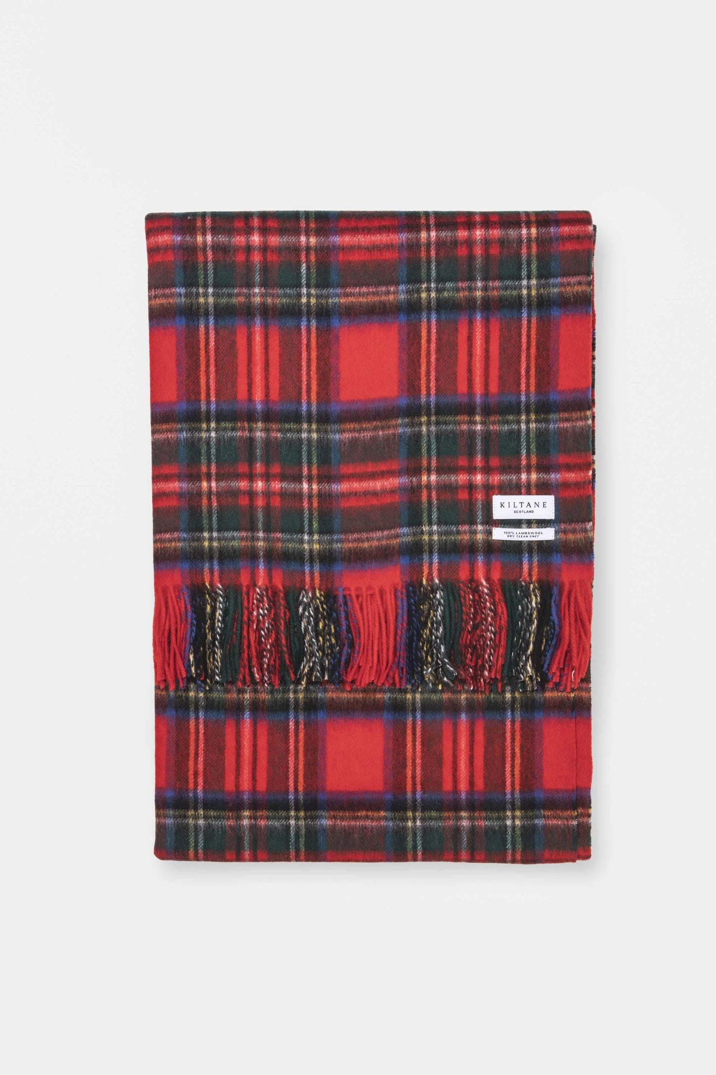 Kiltane Lambswool Throw in Official Royal Stewart tartan, red with green, blue, and yellow plaid pattern and fringed edges