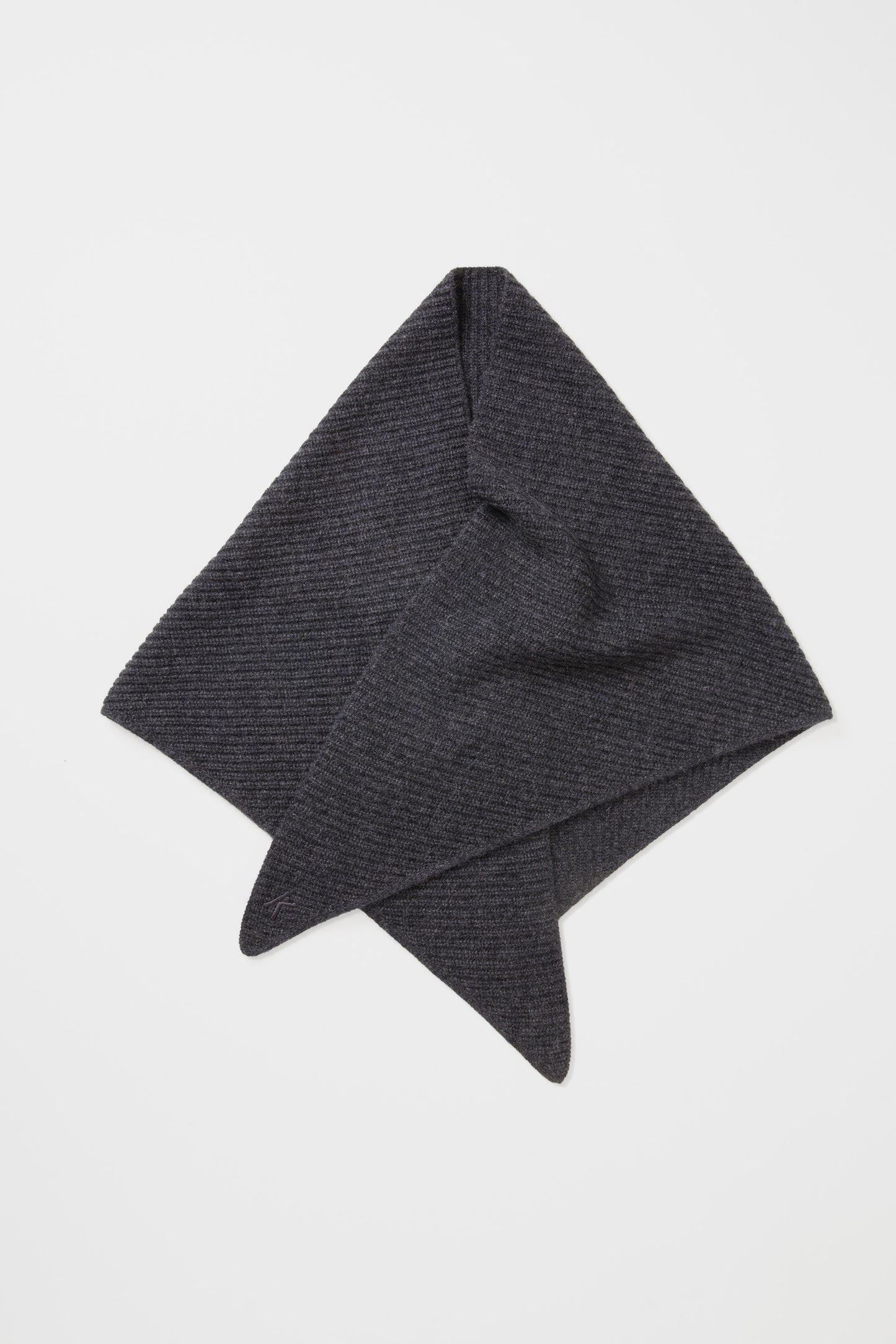 Triangle Knitted Cashmere Scarf in charcoal folded into a diamond shape, showing the ribbed knit texture and pointed ends