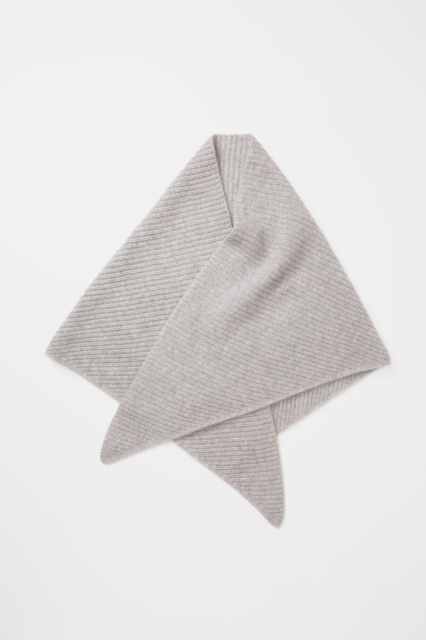 Triangle Knitted Cashmere Scarf in Oyster Grey folded flat showing ribbed knit texture and pointed ends