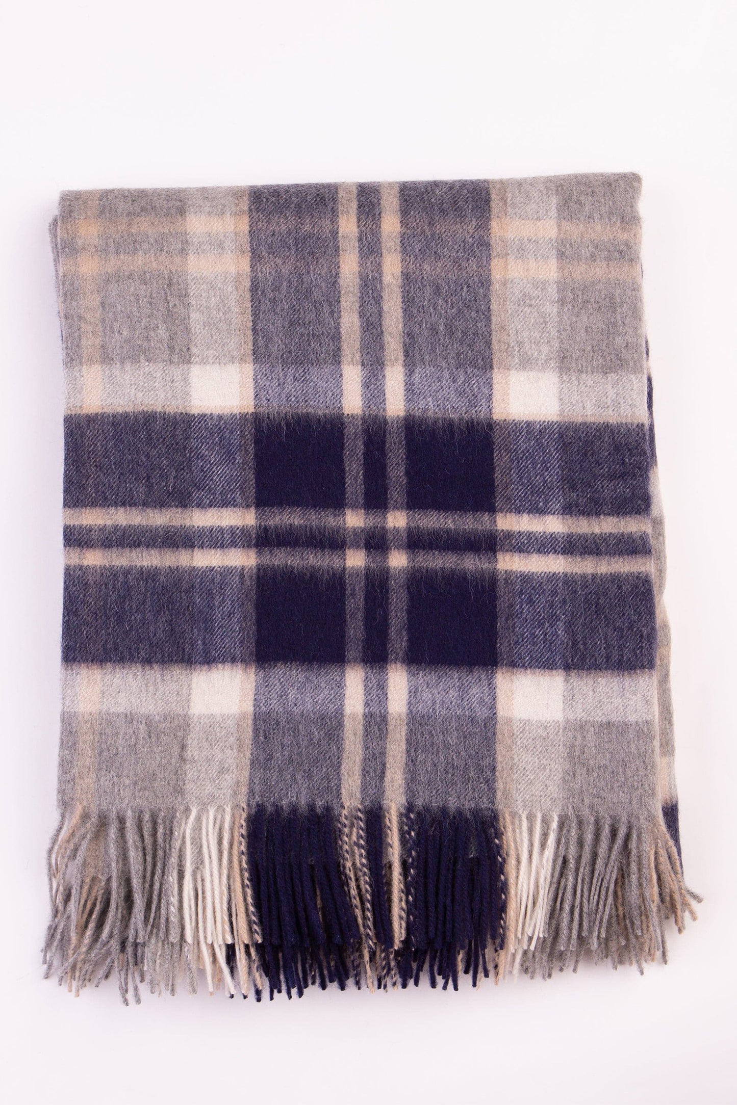 Lambswool Throw - Silver Bannockbane folded flat showing navy, grey, and cream tartan pattern with fringed edges