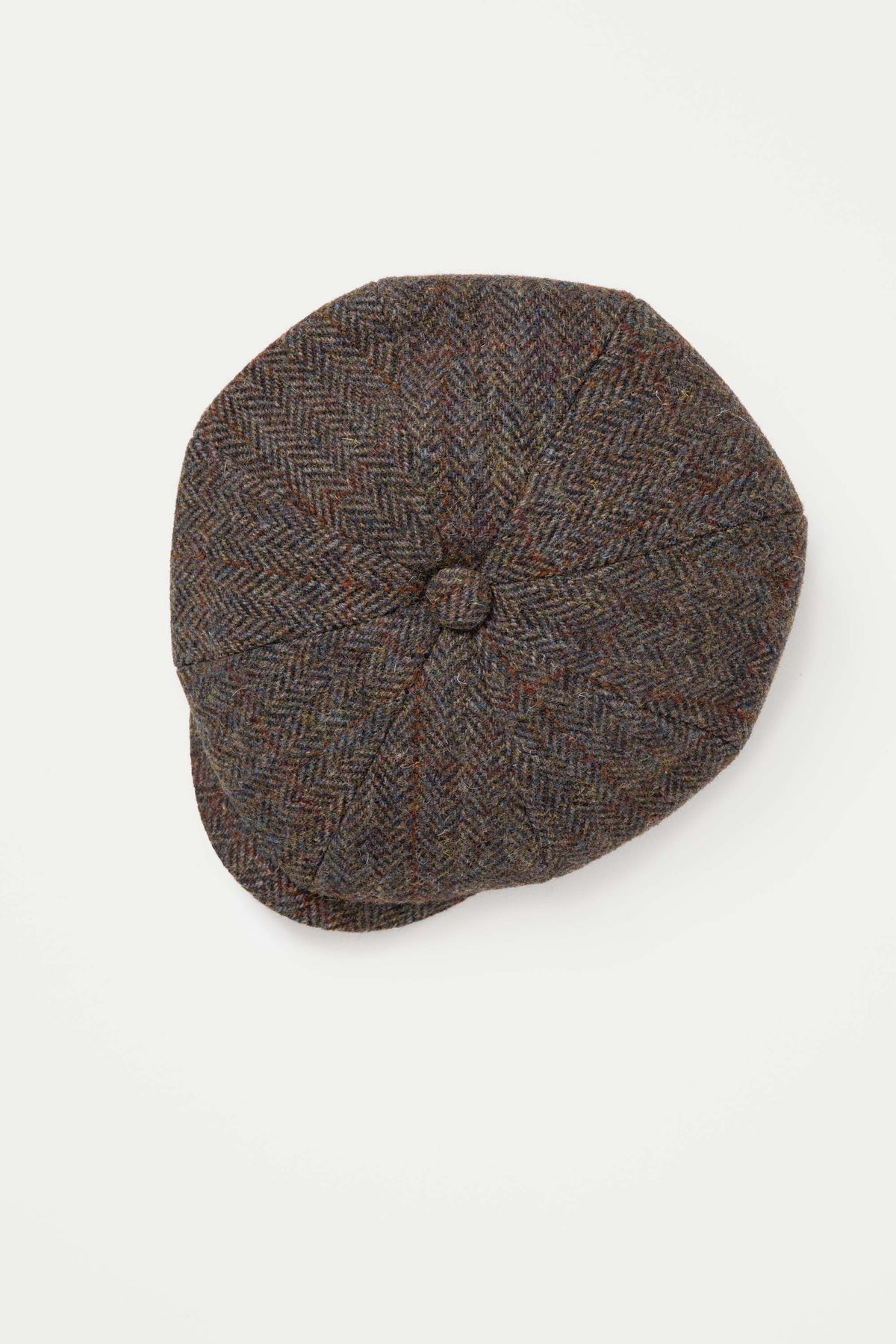 Harris Tweed Carloway Hat in Brown Check viewed from above, showing eight-panel crown and centre button detail