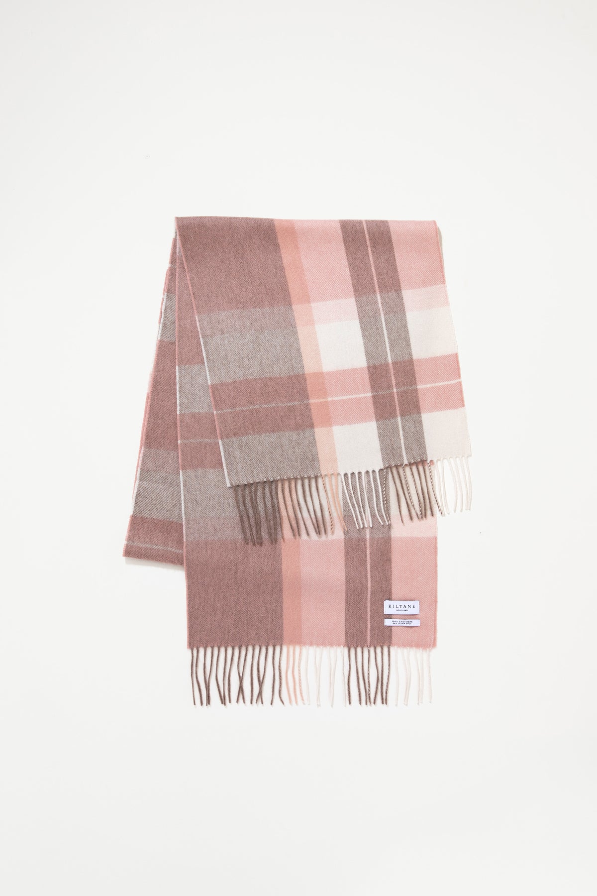 Kiltane Contemporary Check Cashmere Wide Scarf in Cameo Check, folded flat showing pink and taupe plaid pattern with fringed ends