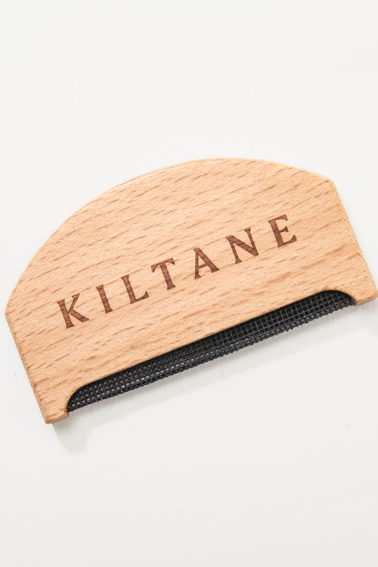 Kiltane Cashmere Comb in natural beechwood with engraved logo and black fine-tooth depilling edge