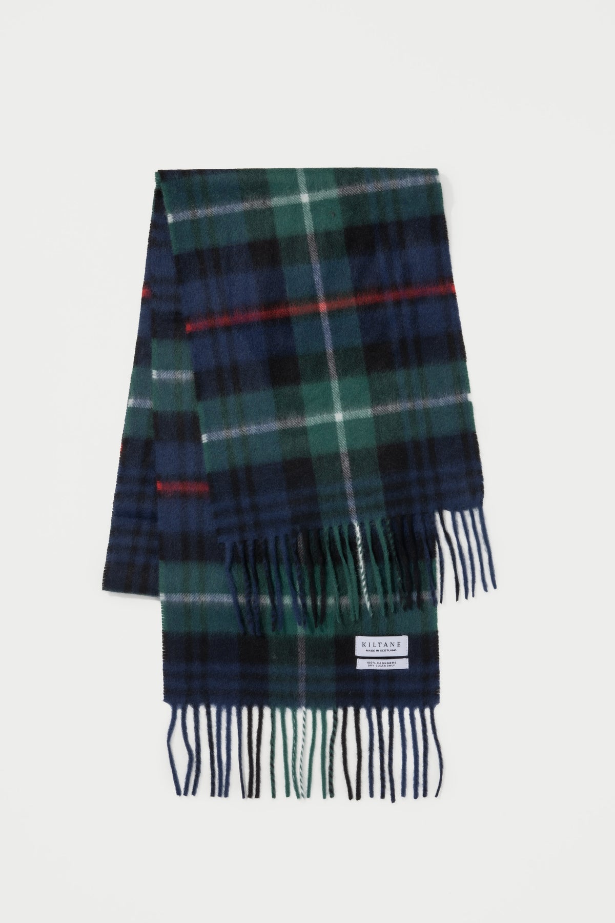 Made In Scotland Heritage Cashmere Scarf in Exploded Mackenzie tartan with navy, green, and red plaid pattern and fringed ends