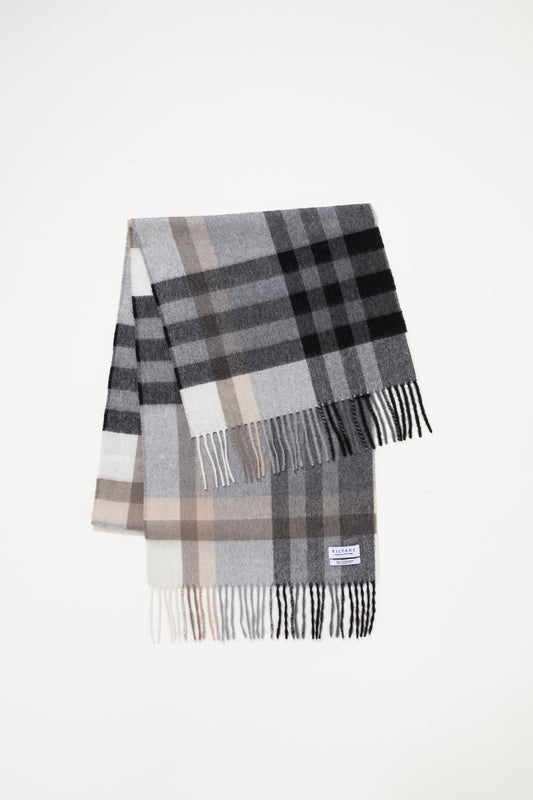 Kiltane Made in Scotland Tartan 2 Cashmere Wide Scarf in black and grey, folded to show check pattern and fringed ends