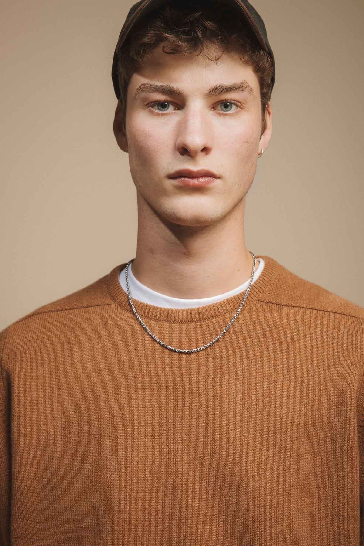 Wax Baseball Cap in olive worn by model, front-facing view showing the low-profile fit and curved brim