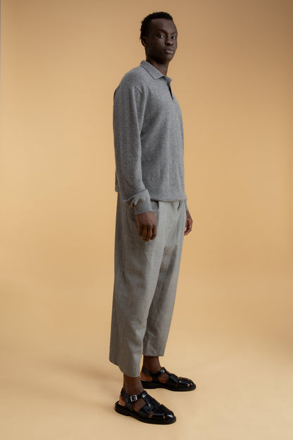 Men's Long Sleeved Knitted Polo Shirt in Derby Grey, 100% cashmere with spread collar and relaxed fit, styled with grey trousers
