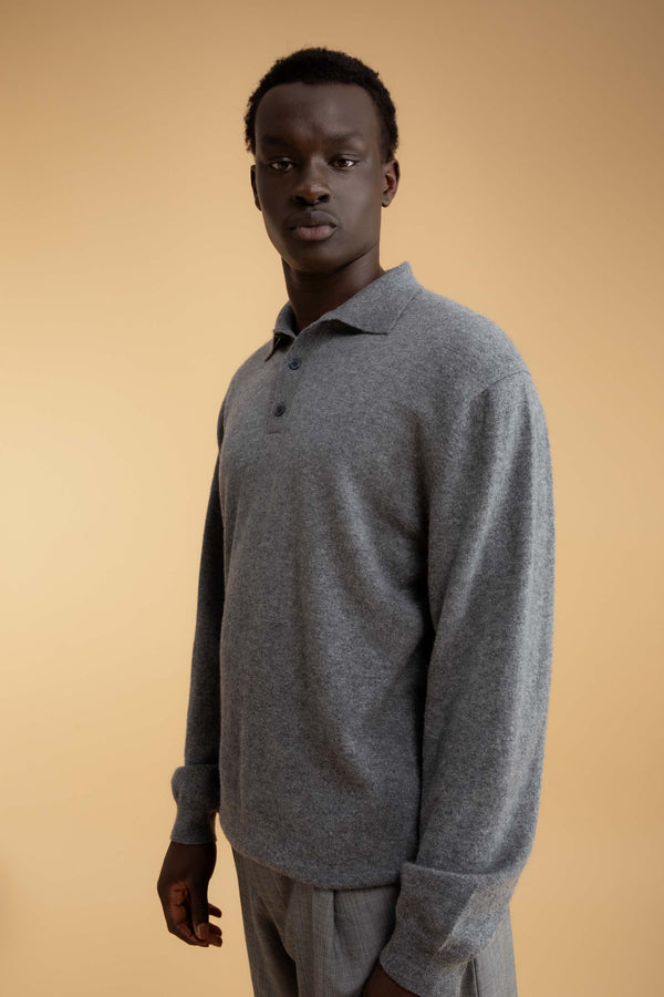 Men's Long Sleeved Knitted Polo Shirt in Derby Grey — front three-quarter view showing collar, two-button placket, and relaxed fit