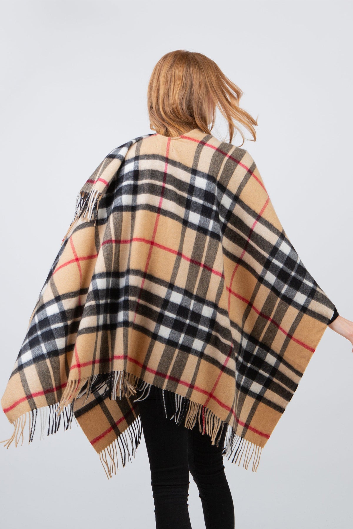 Back view of Scotty Thompson Cashmere Wrap in Camel, showing full tartan plaid pattern with fringed hem draped over shoulders