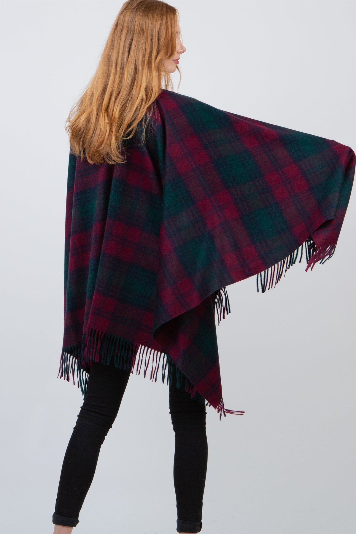 Heritage Tartan Cashmere Wrap - Lindsay shown from behind, displaying the burgundy and green tartan pattern with fringed edges