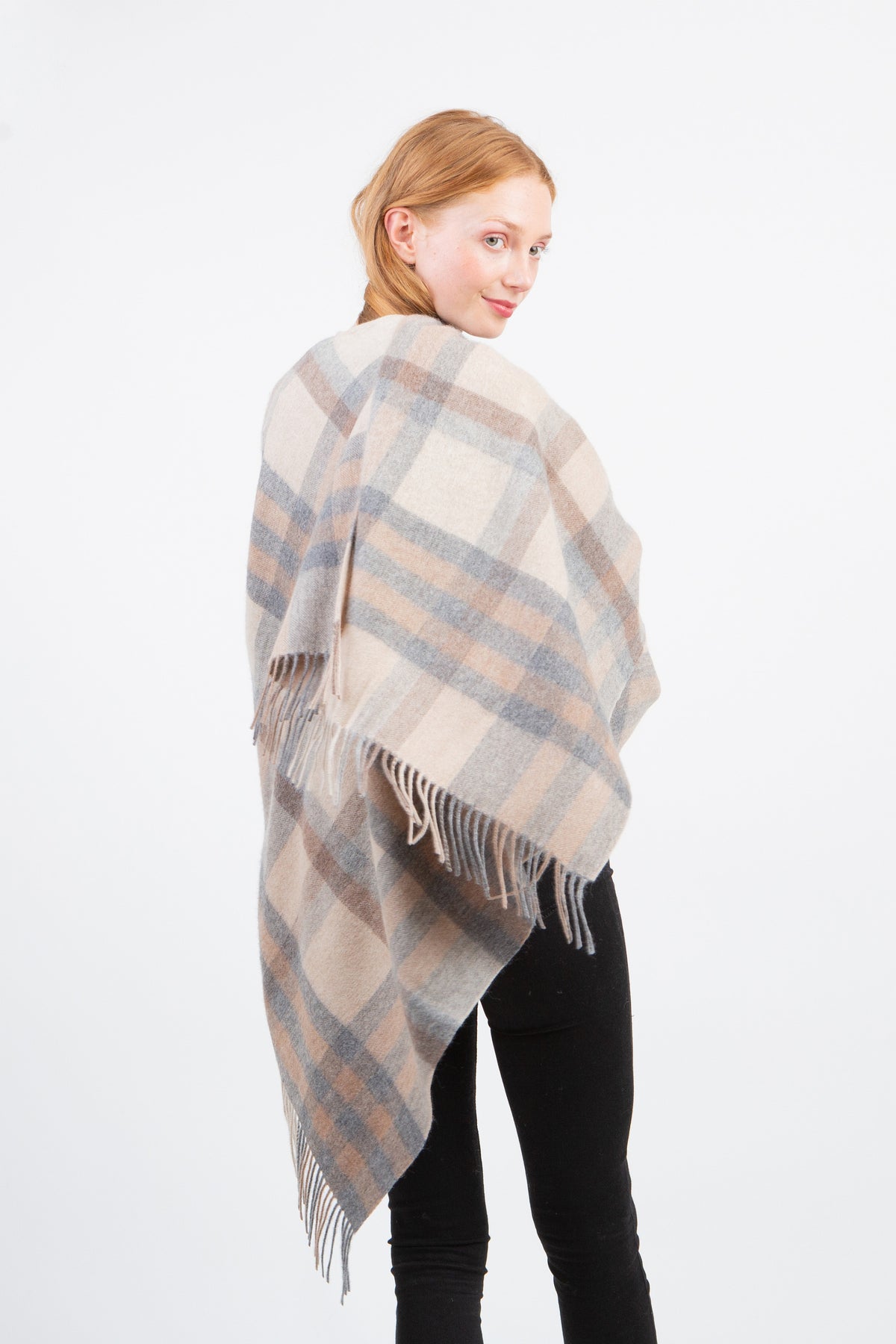 Back view of Tartan 2 Lambswool Wrap in Natural, showing full plaid pattern in beige, grey, and taupe with fringed edges