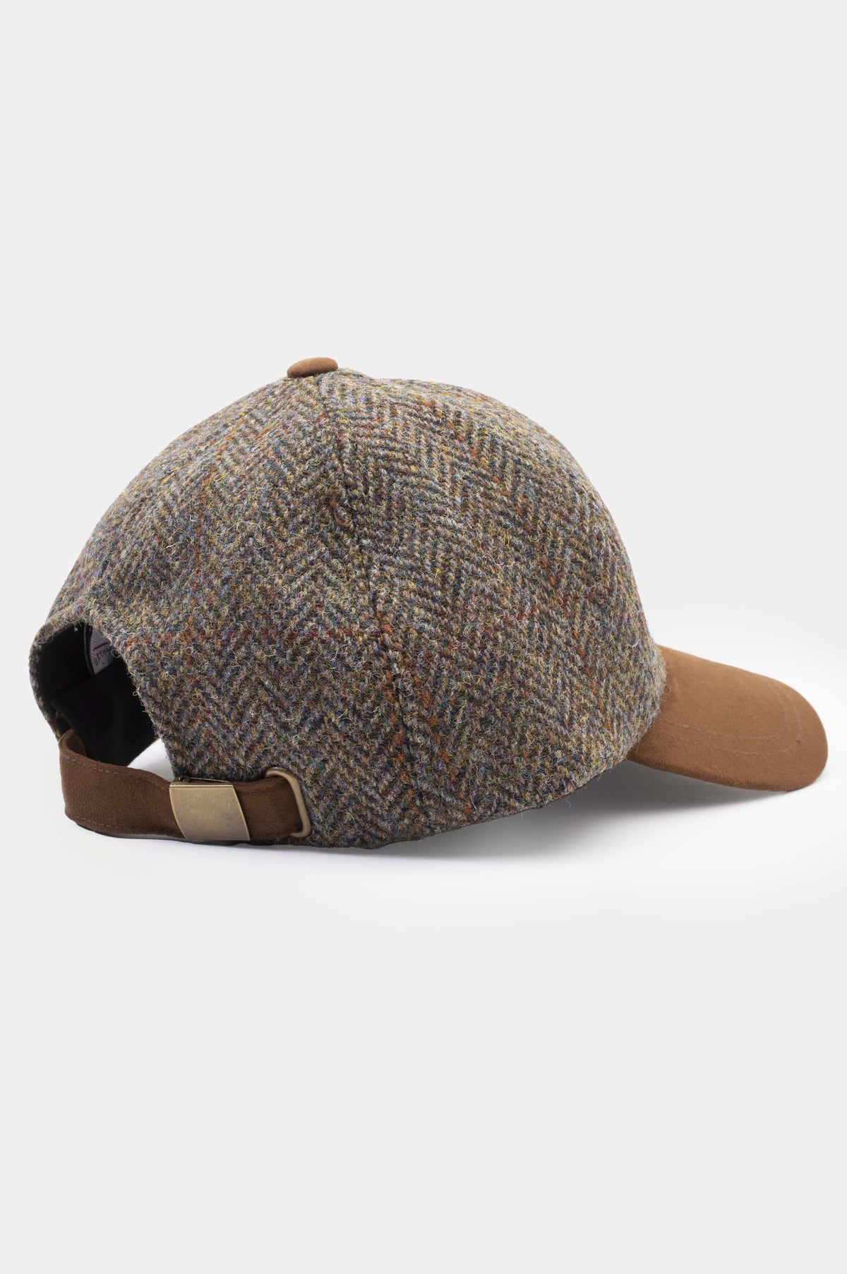 Harris Tweed Baseball Cap in Brown Check — back view showing suede adjustable strap with brass buckle and herringbone weave detail