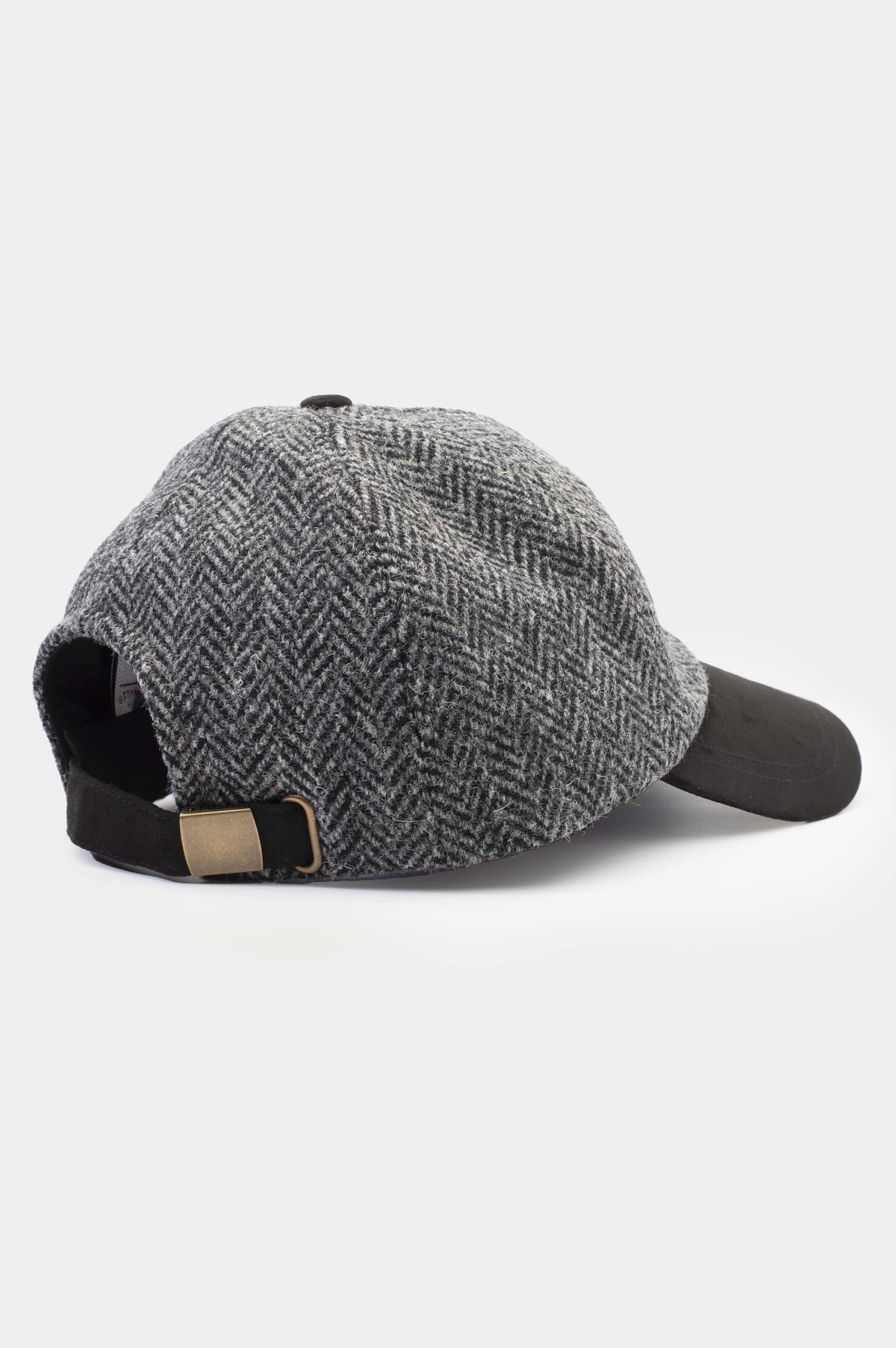 Harris Tweed Baseball Cap in Charcoal Herringbone – back view showing adjustable black strap with brass buckle closure