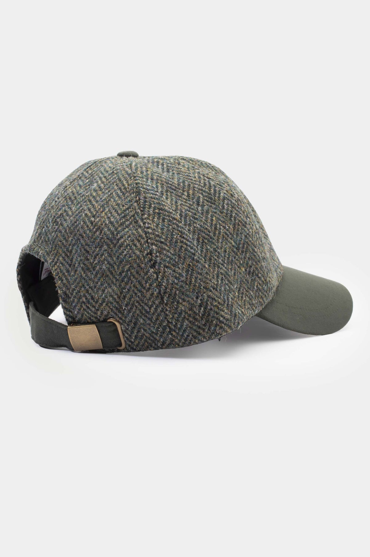 Harris Tweed Baseball Cap in dark green herringbone — back view showing leather strap with brass buckle closure