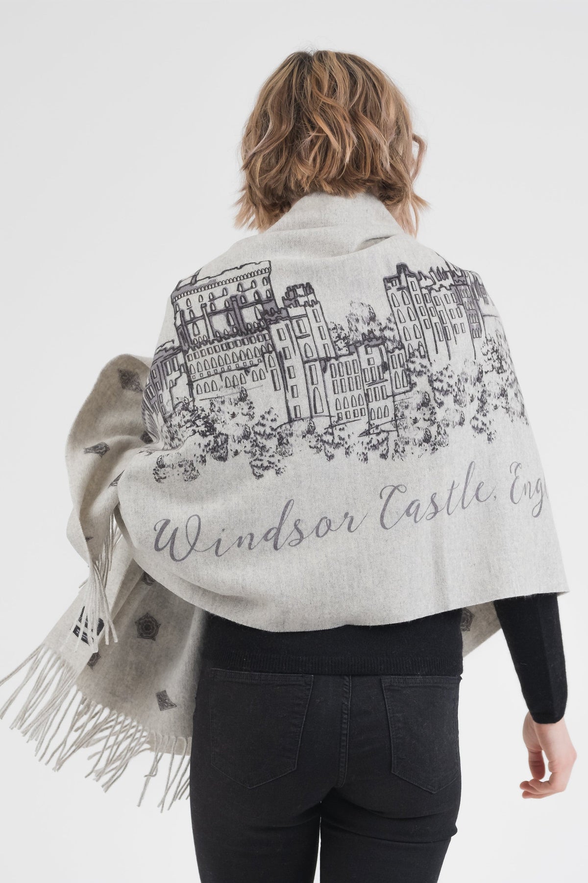 Back view of City Cashmere Double Sided Stole - Windsor Castle, showing detailed castle illustration and script text on grey cashmere with fringe