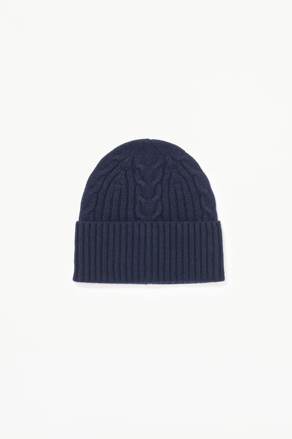 Cashmere Cable Beanie in Dark Navy laid flat, showing cable knit pattern on crown and ribbed fold-up cuff