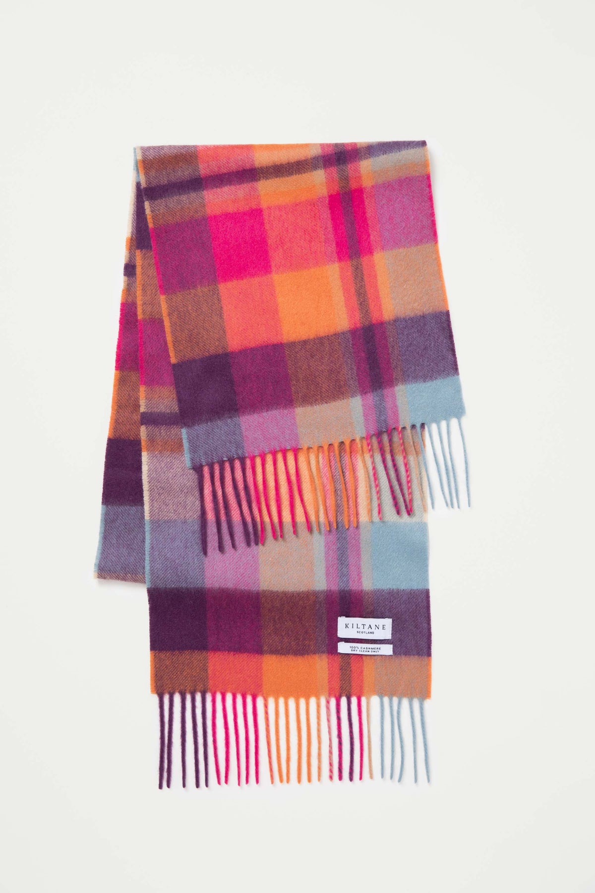 Kiltane Scotland label detail on Square Check Cashmere Scarf - Orient Ginger, showing multicoloured fringe ends