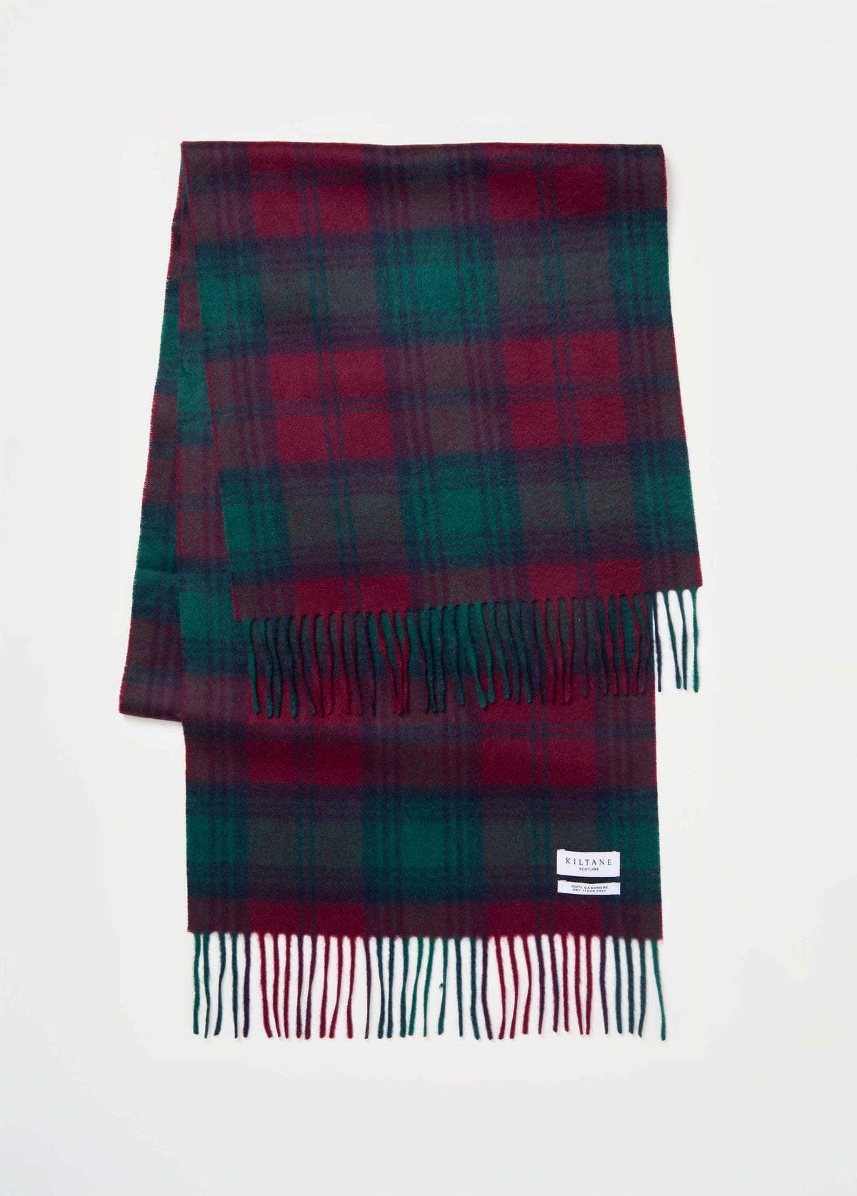 Heritage Tartan Cashmere Wide Scarf - Lindsay laid flat showing full tartan pattern in deep red and green with fringed ends