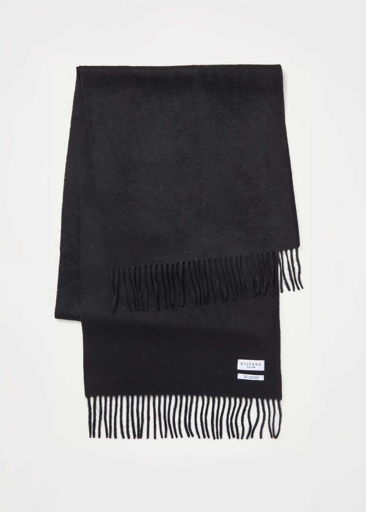 Black scarf with fringes on a white background