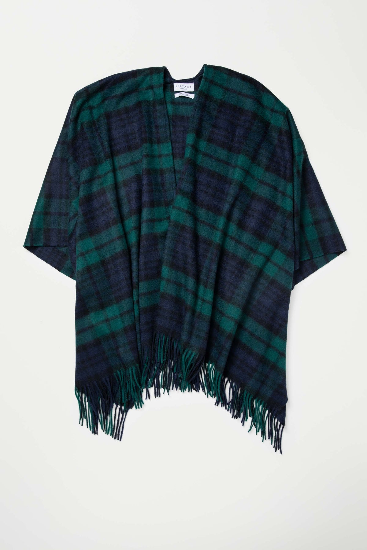 Heritage Tartan Cashmere Wrap in Blackwatch laid flat showing open-front drape, navy and green plaid pattern, and fringed hem