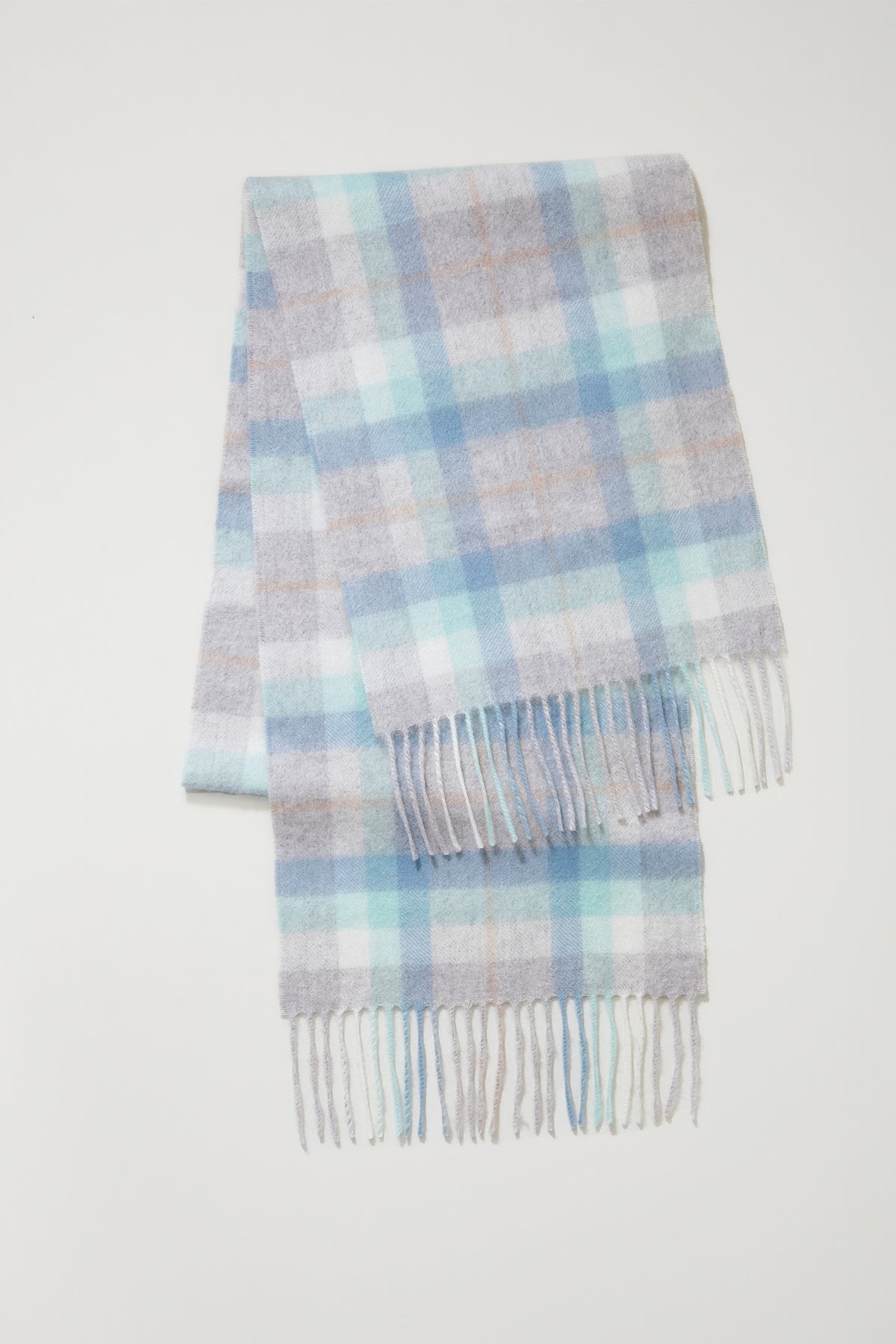 Contemporary Check Cashmere Scarf in Aqua folded flat showing full plaid pattern in soft blue, mint, grey, and blush tones with fringed ends