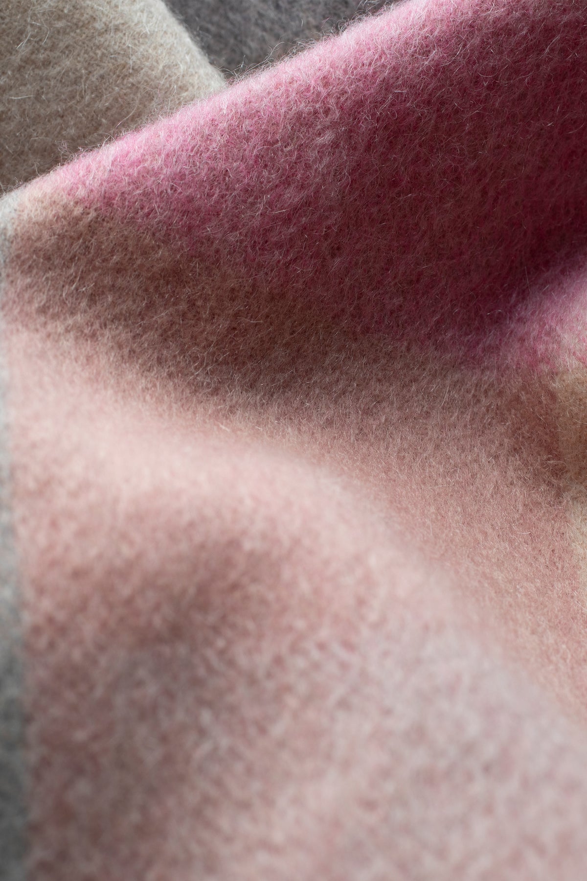 Close-up of 3 Square Cashmere Scarf in Summer Fruits showing soft brushed texture with pink, beige, and grey colour blocks