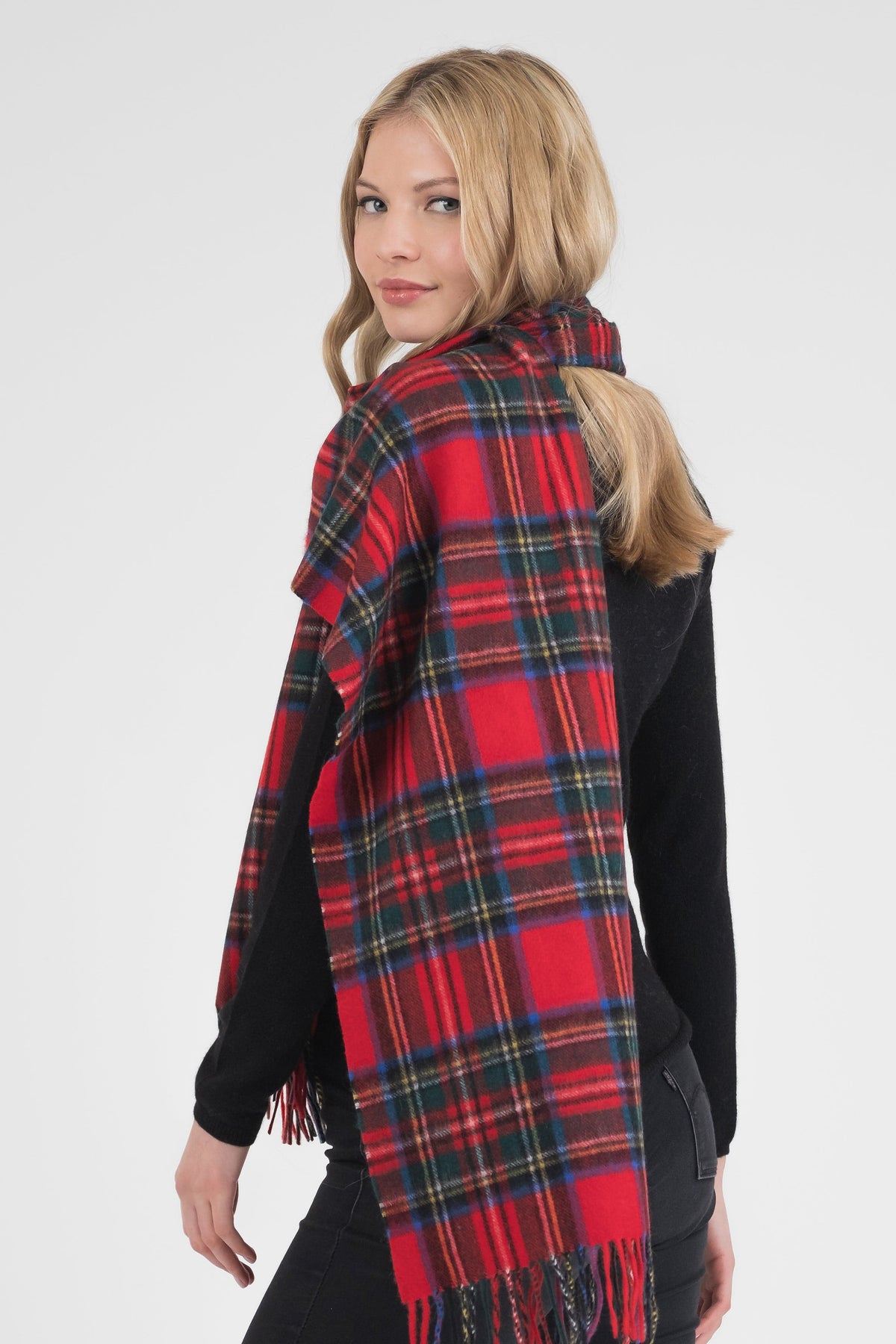 Heritage Tartan Cashmere Wide Scarf in Royal Stewart draped over shoulders, showing full plaid pattern and fringed ends