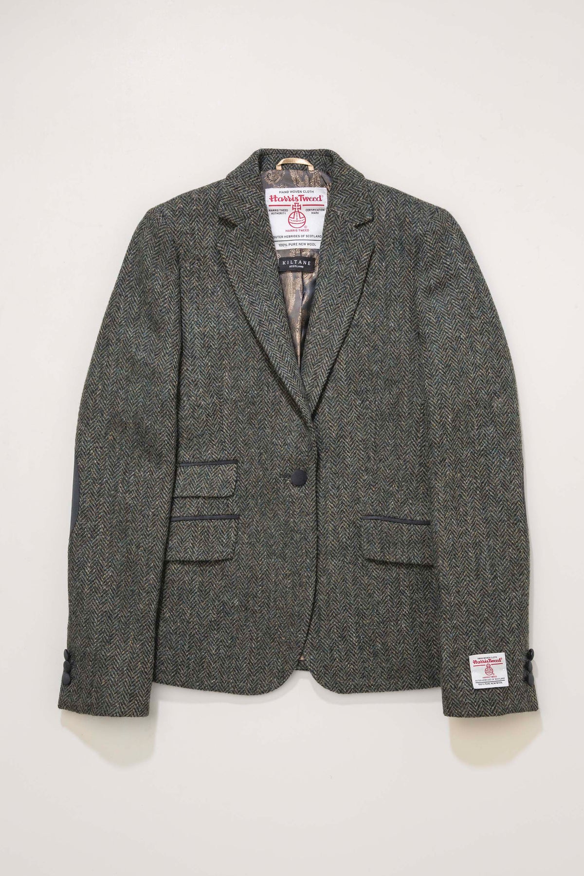 Women's Harris Tweed Janice Blazer in dark green herringbone, front view open showing satin lining and leather-trimmed pockets