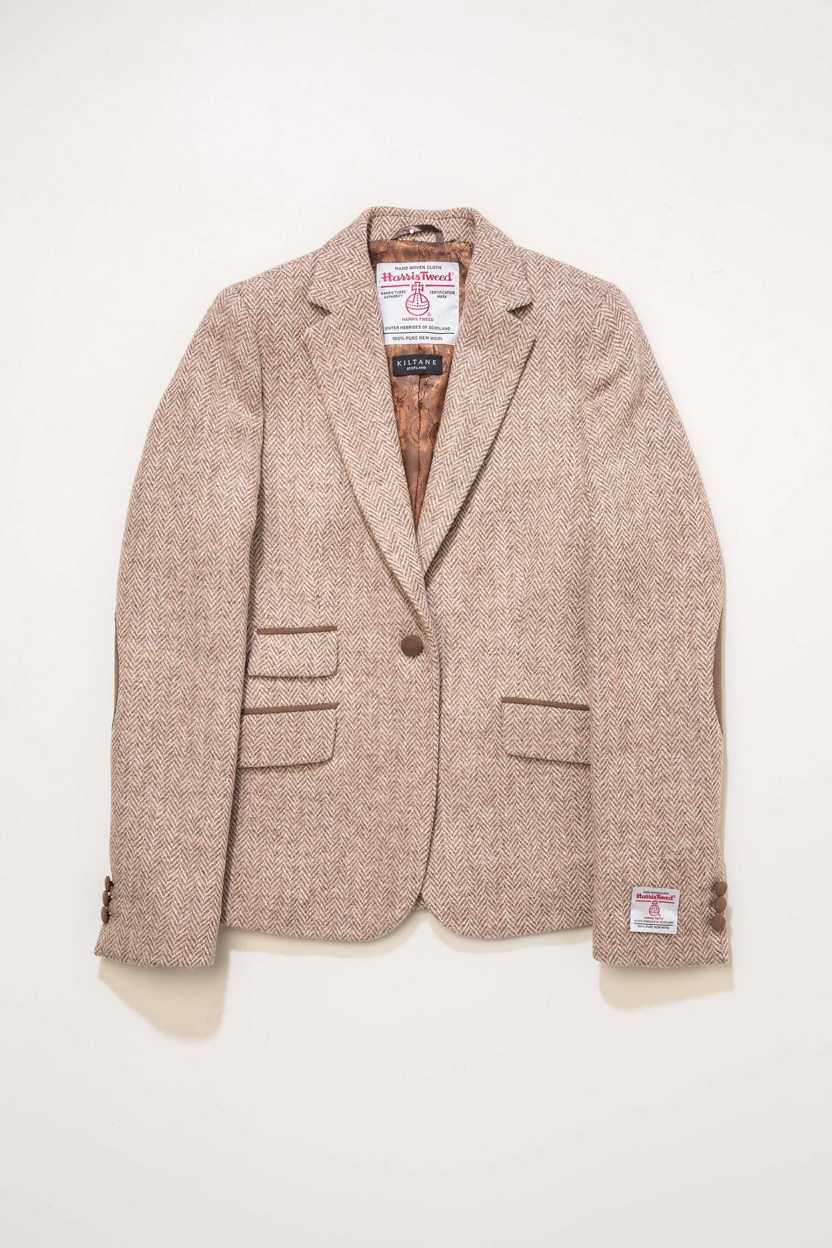 Women's Harris Tweed Janice Blazer in light beige herringbone, laid flat showing open front with Kiltane satin lining and labels