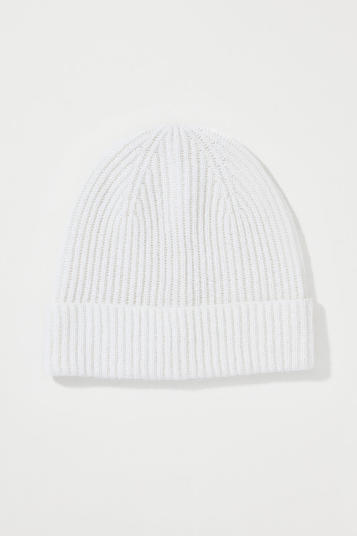 Unisex Cashmere Ribbed Beanie Hat in Soft White, front view showing ribbed knit texture and folded cuff
