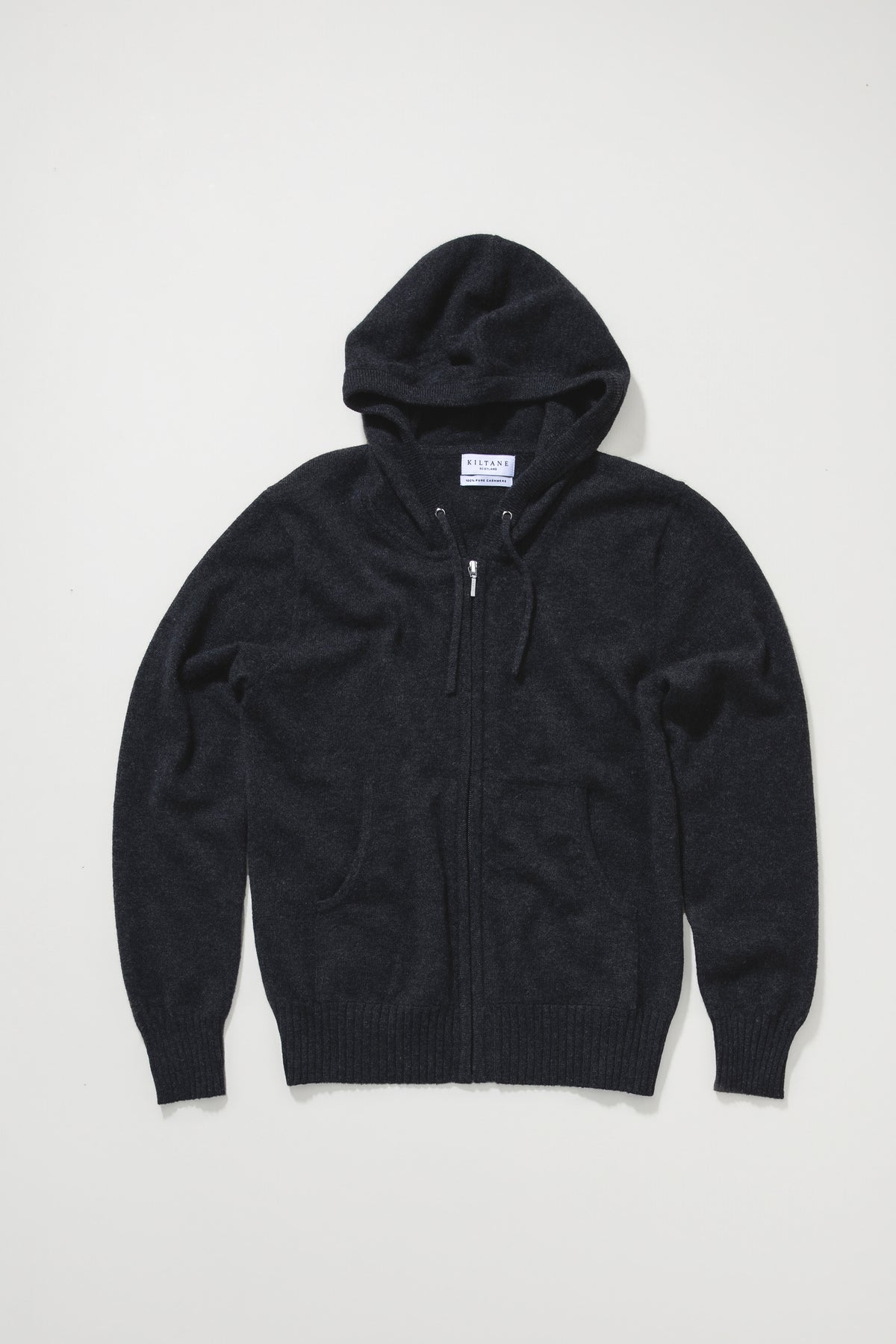 Kiltane Unisex Cashmere Zip Hoodie in charcoal laid flat, showing full front zip, hood, and side pockets with ribbed hem