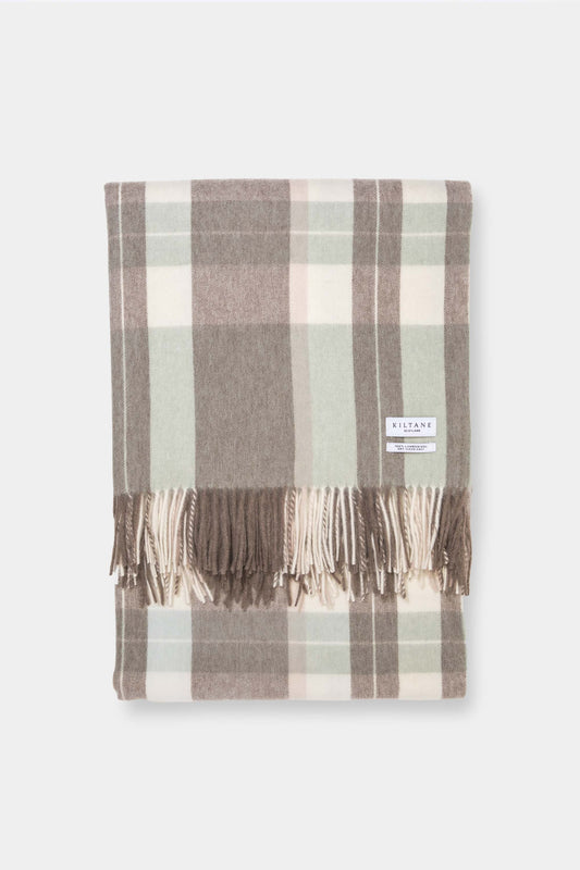 Kiltane Lambswool Throw in Seafoam Check, folded to show soft plaid pattern in sage green, taupe, and cream with fringed edges