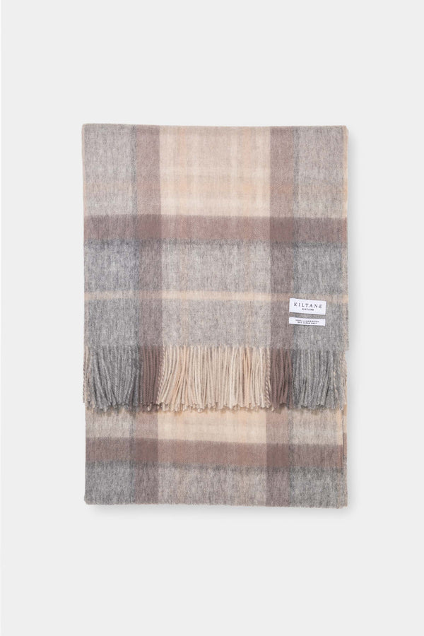 Kiltane Lambswool Throw in Mackellar Natural, soft plaid pattern in muted grey, blush pink, and cream with fringed edges