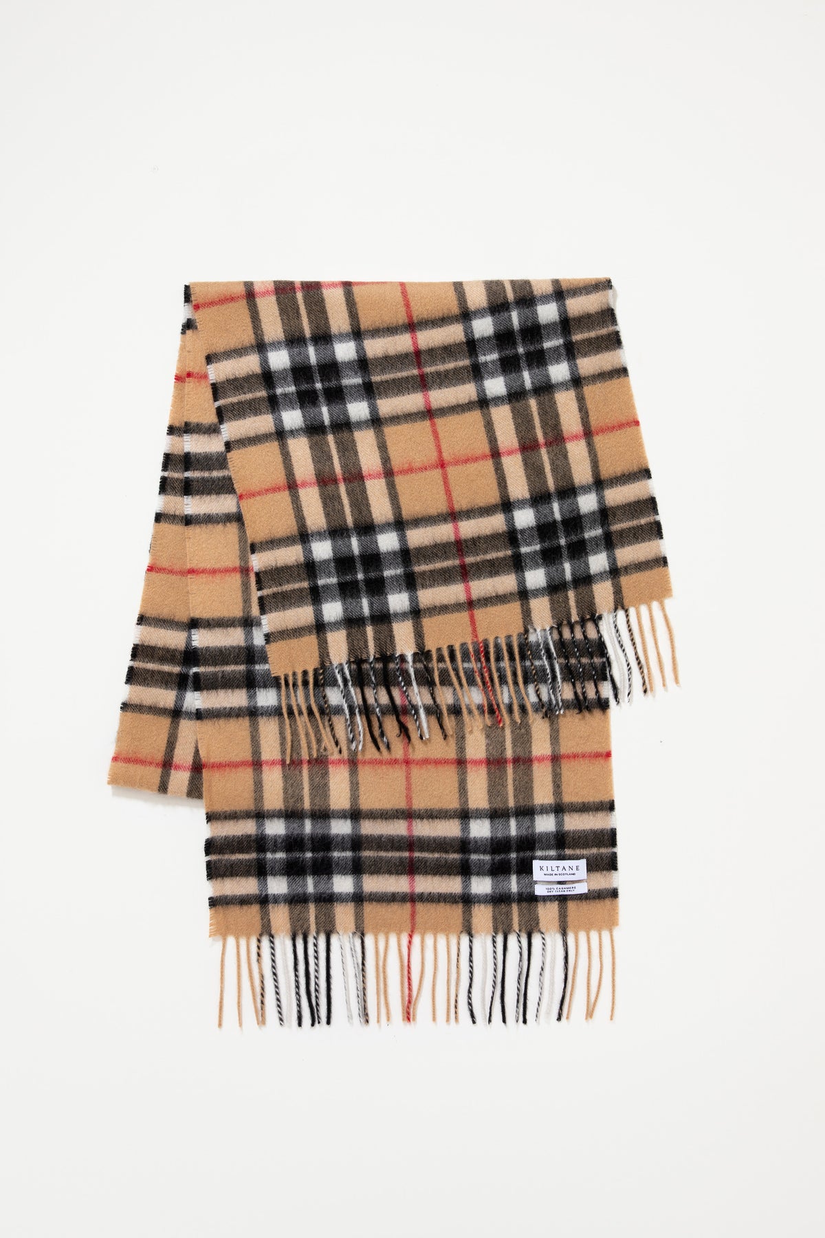 Kiltane Scotty Thompson Cashmere Wide Scarf in Camel folded flat showing classic tartan plaid pattern with fringed ends