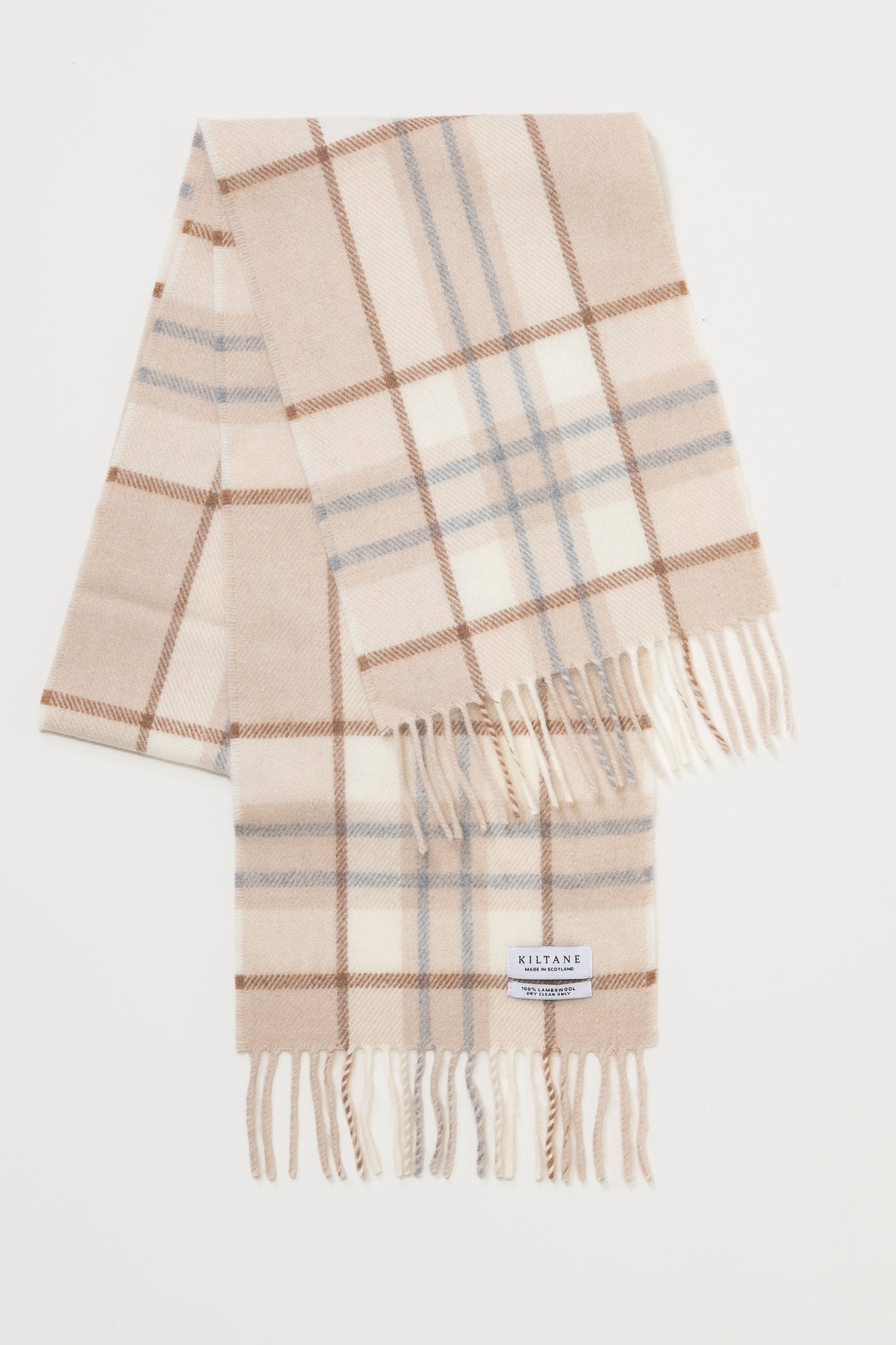Kiltane Made in Scotland Lambswool Scarf in Lunanburn Sandstone, flat lay showing plaid pattern with fringed ends and brand label