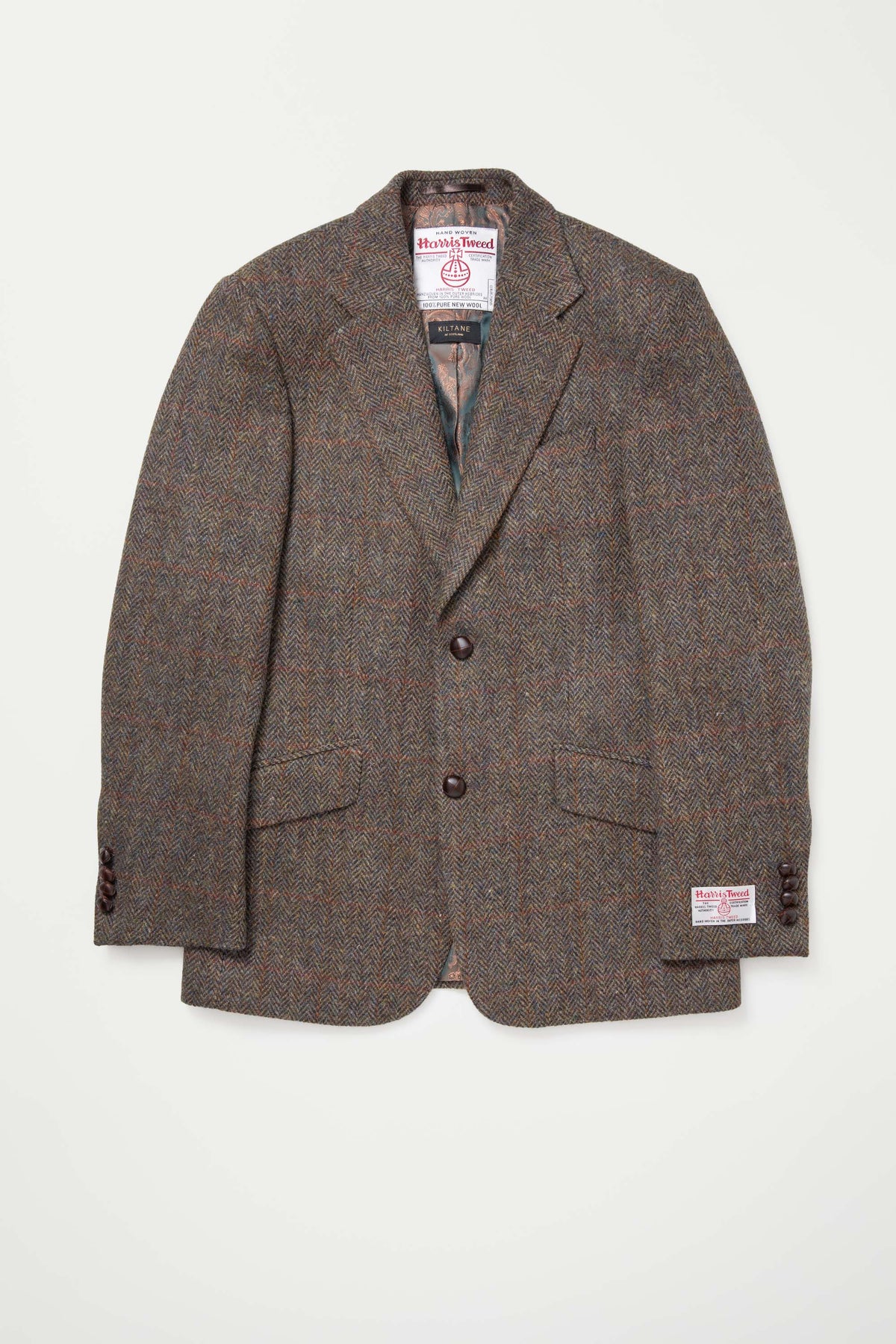 Men's Harris Tweed Finlay Jacket in brown check laid flat, showing notch lapel, two-button front, and interior Kiltane label