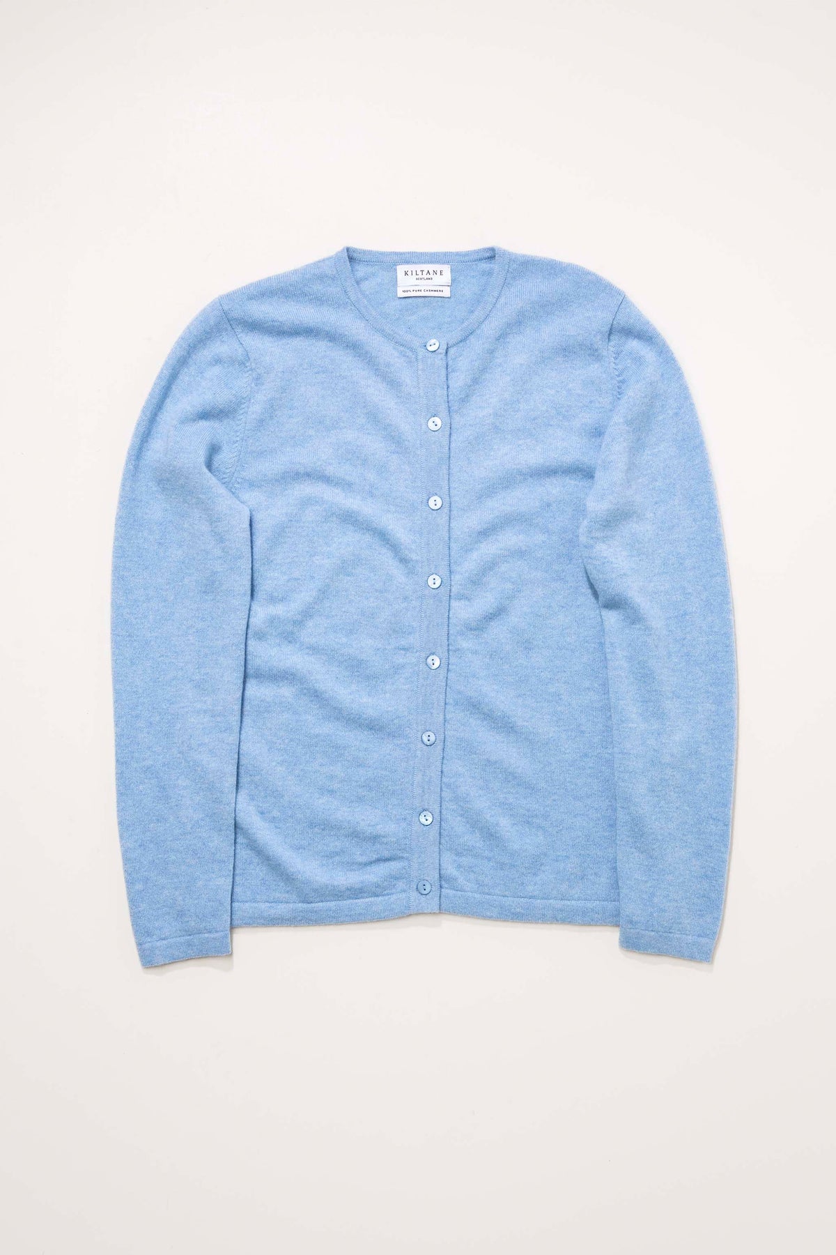 Kiltane Women's Cashmere High Button Cardigan in Glacier blue, flat lay front view showing full button placket