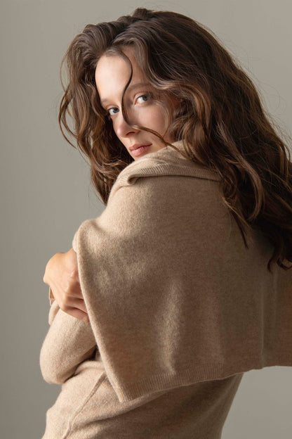 Back view of the Women's Cashmere High Button Cardigan in Vicuna, showing soft knit texture and raised collar detail