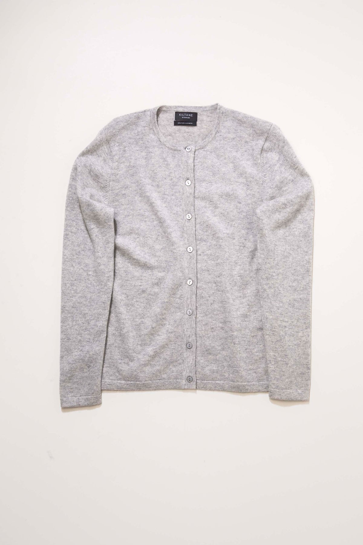 Kiltane Women's Cashmere High Button Cardigan in Light Grey, flat lay front view showing full button placket and crew neck