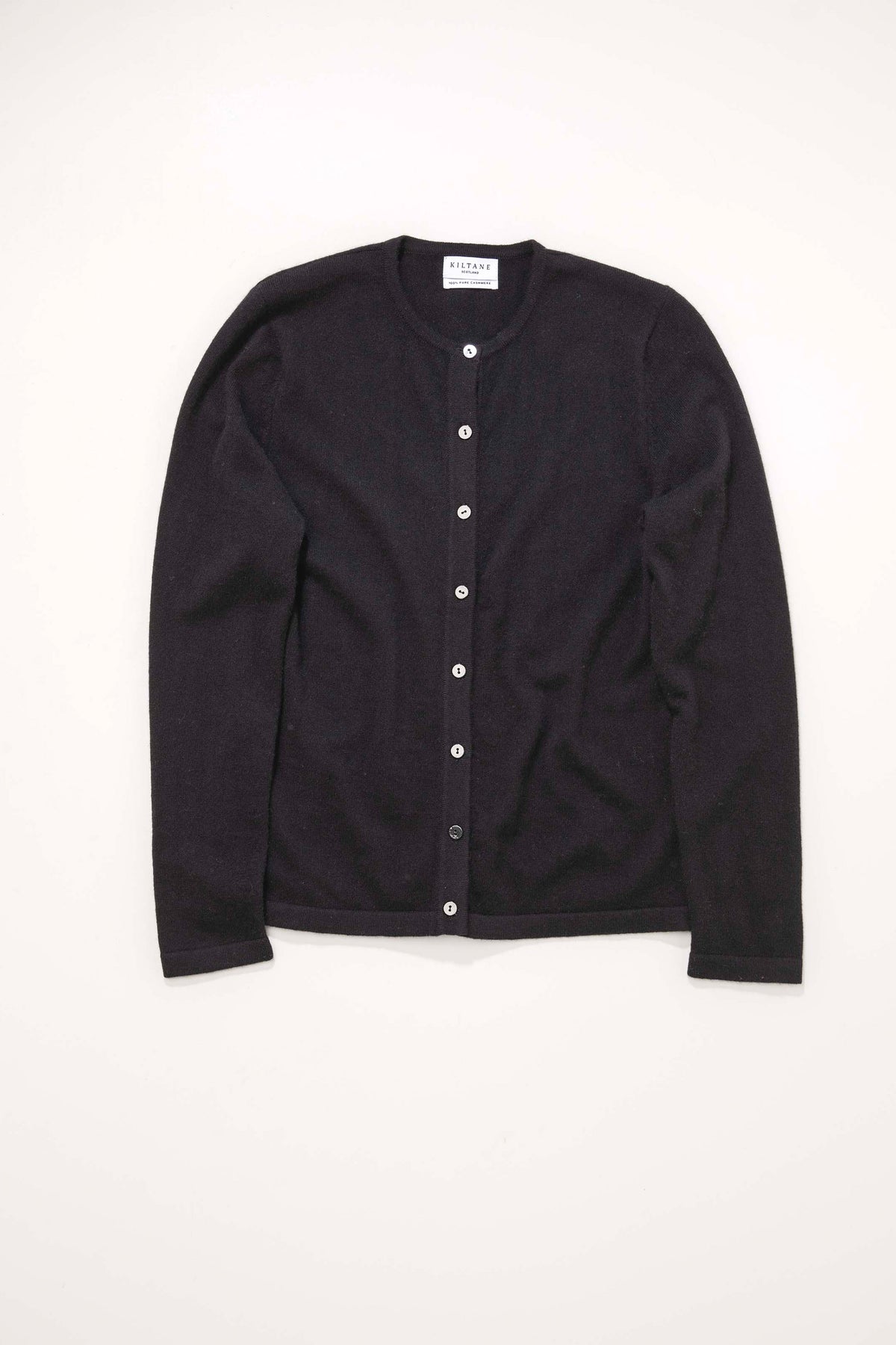 Kiltane Women's Cashmere High Button Cardigan in black, flat lay showing full front with button-up closure and crew neck