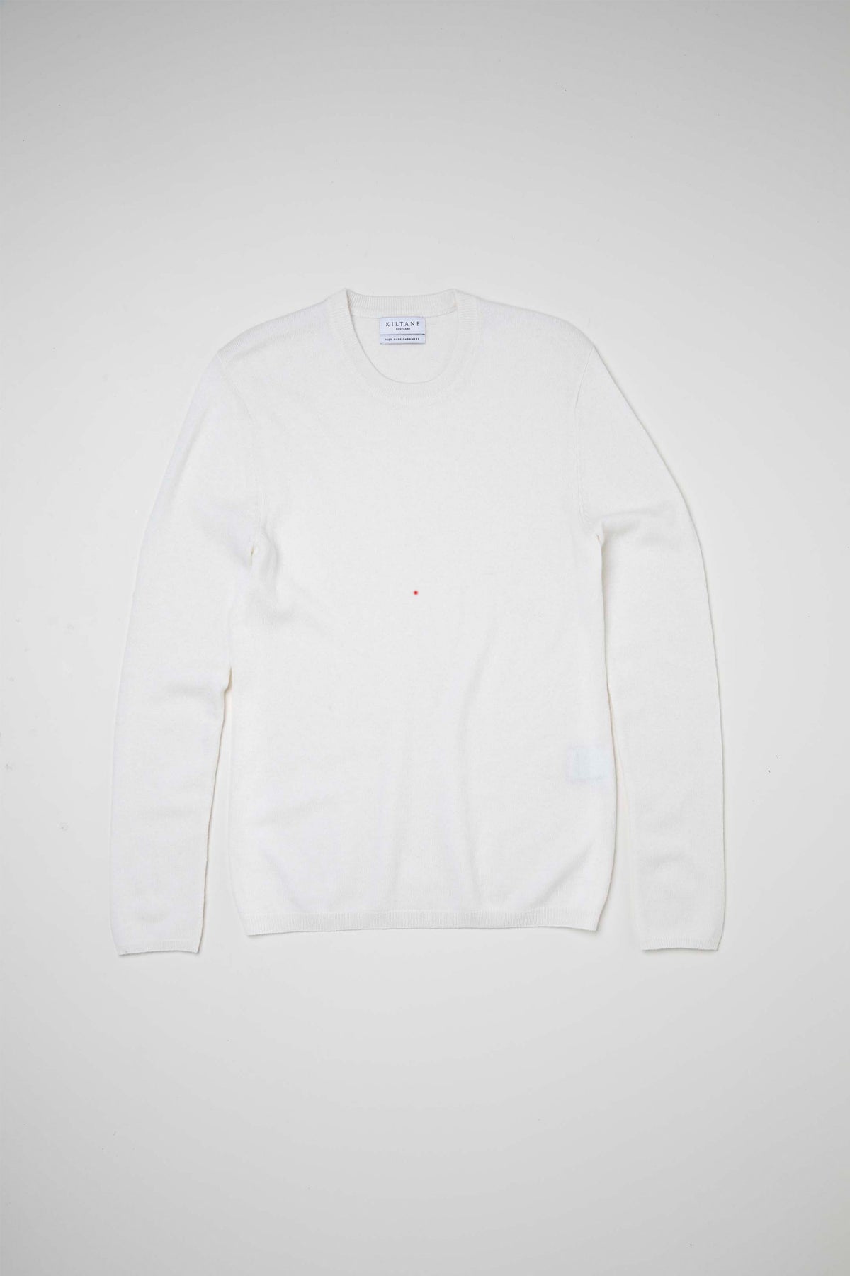 Women's Cashmere Crew Neck Jumper in Soft Cream laid flat, showing full front with crew neckline and Kiltane brand label