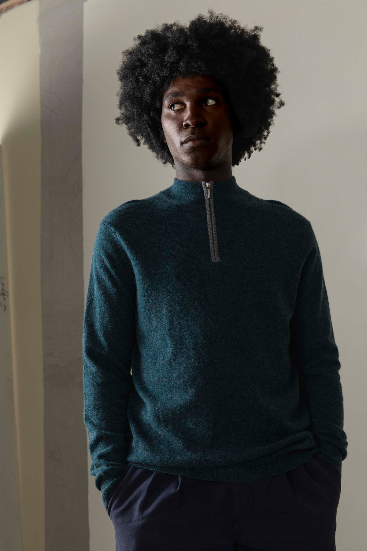 Men's Half Zip Jumper in deep green 100% cashmere with grey zip detail, relaxed fit, worn front-on