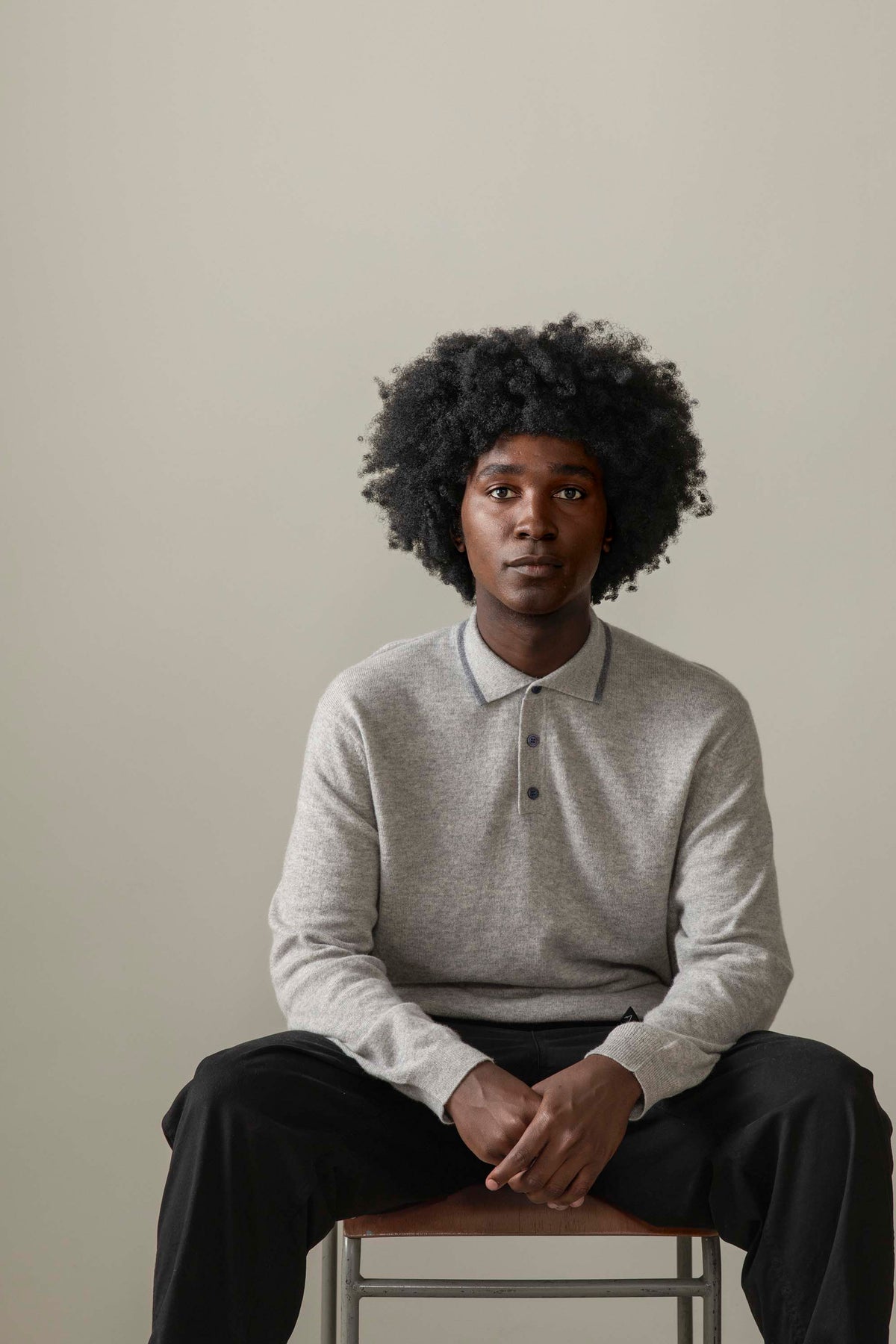 Men's Long Sleeved Knitted Polo Shirt in Oyster Grey, front view showing three-button placket and contrast collar tipping