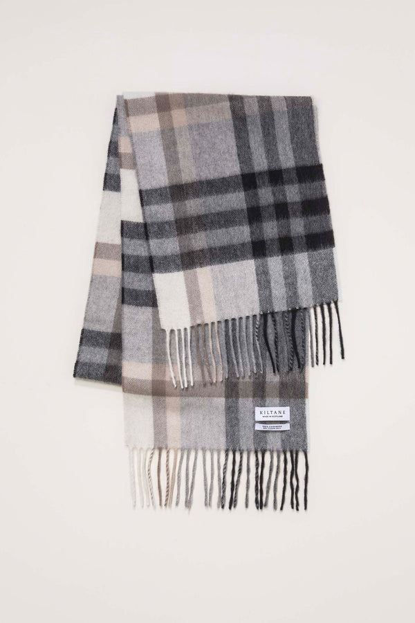 Kiltane Made in Scotland Tartan 2 Cashmere Scarf in black and grey plaid, folded flat showing fringe detail and brand label