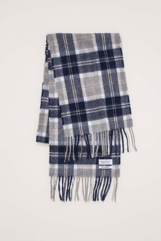 Heritage Cashmere Scarf in Silver Bannockbane folded flat showing navy, grey, and white plaid pattern with twisted fringe detail